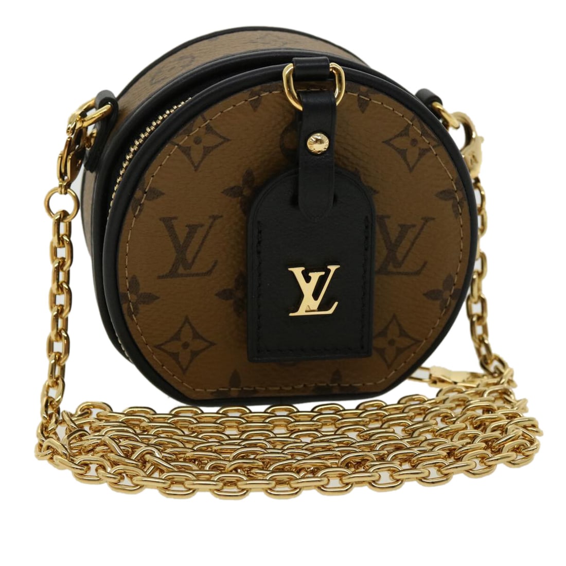 Reverse Monogram Giant Canvas Boite Chapeau Souple Handbag by Louis Vuitton: Reverse Monogram Giant Canvas Boite Chapeau Souple Handbag by Louis Vuitton The Louis Vuitton Boite Chapeau Souple Bag in Reverse Monogram Giant canvas is a stylish accessory designed for women. It fe