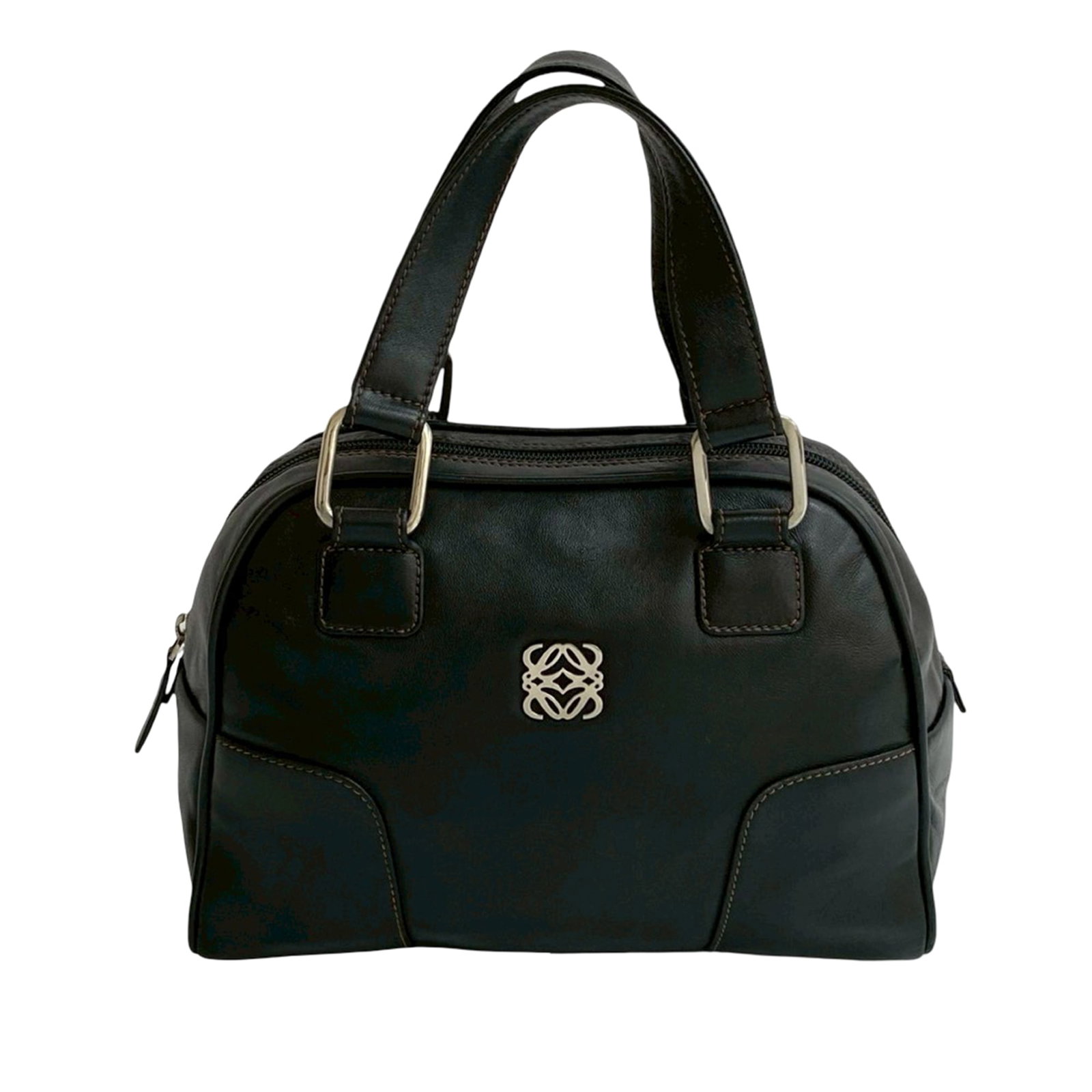 LOEWE Anagram Black Leather Tote with Top Zip and Interior Pockets: LOEWE Anagram Black Leather Tote with Top Zip and Interior Pockets This LOEWE Leather Anagram Handbag features a black leather body with flat handles and a top zip closure. The interior is equipped wi