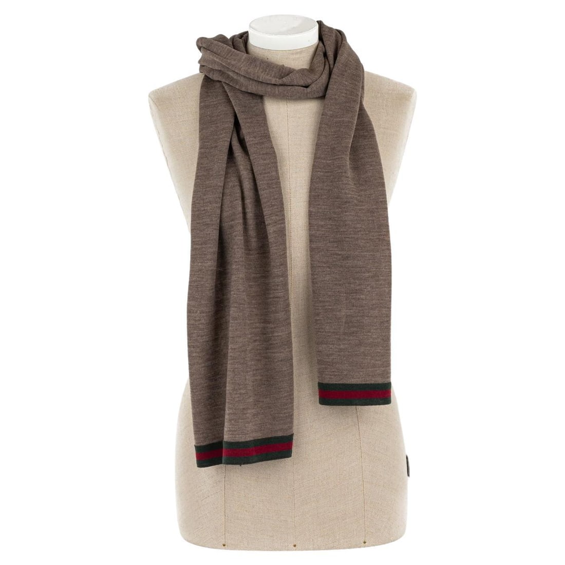 Gucci Brown Wool Shawl with Green Red Ends 16x78: Gucci Brown Wool Shawl with Green Red Ends 16x78 This elegant brown wool shawl by Gucci is a luxurious accessory, perfect for adding a touch of sophistication to any outfit. Measuring 16 inches in wid