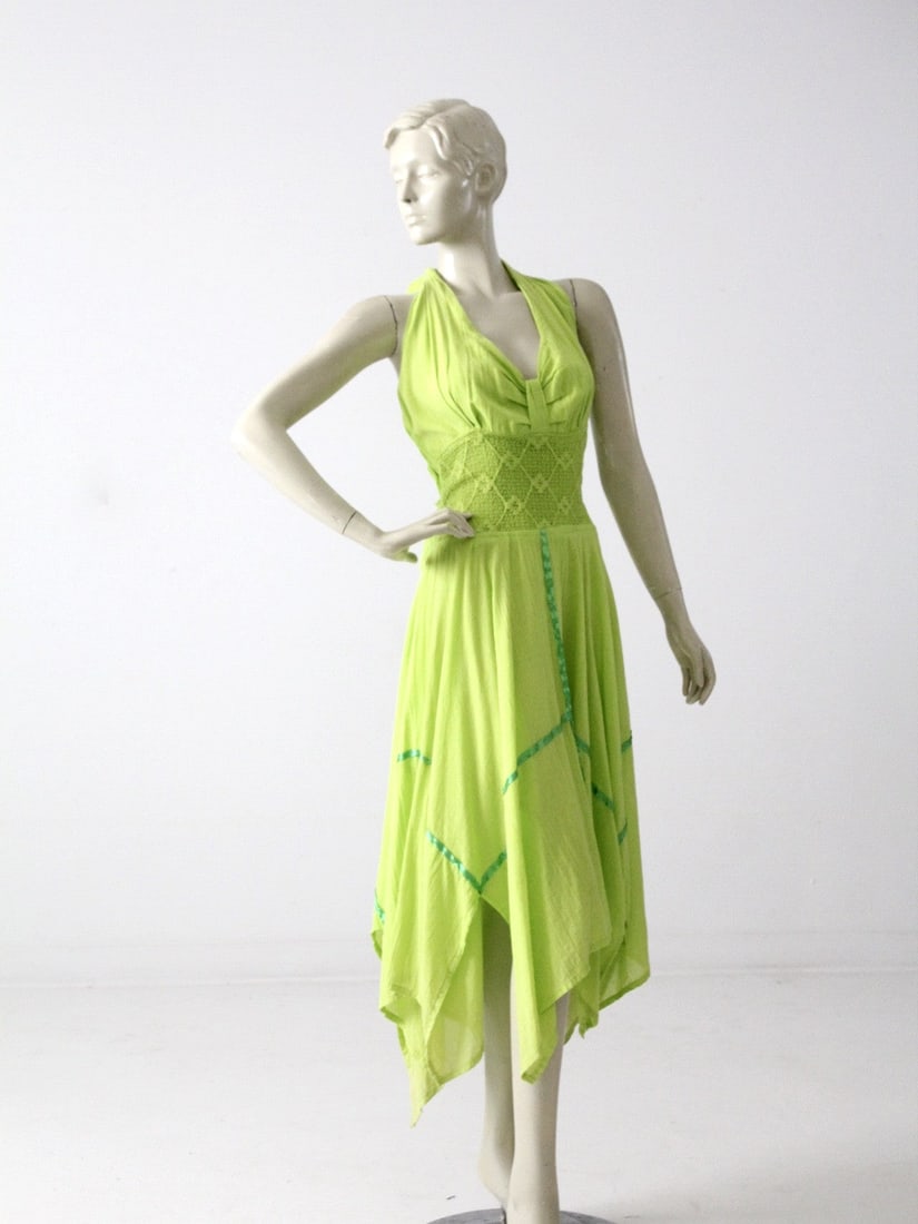 1970s Lime Green Gauze Halter Dress with Floral Lace and Ribbon: 1970s Lime Green Gauze Halter Dress with Floral Lace and Ribbon This stunning 1970s gauze halter dress features a vibrant lime green hue crafted from lightweight gauze cotton. The vintage sundress sho