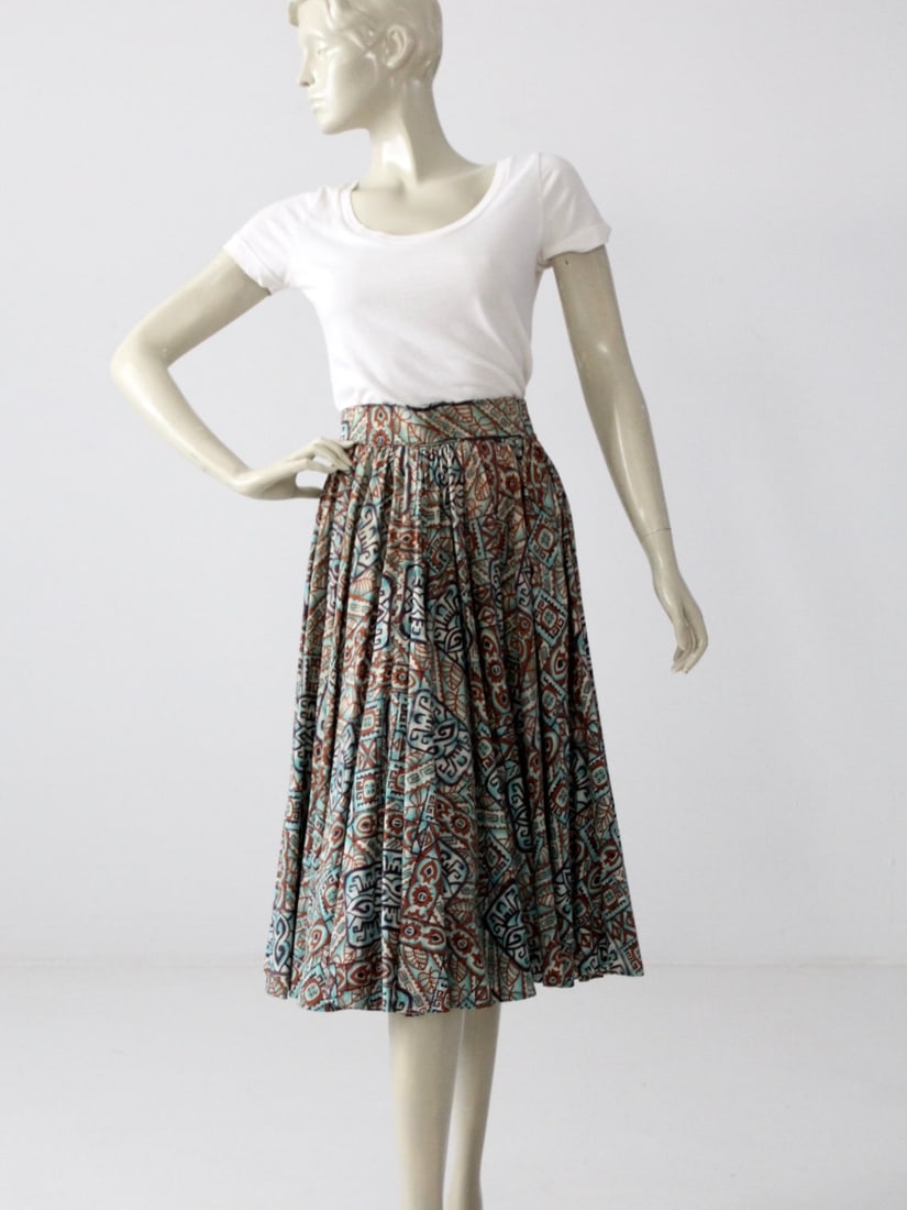 1950s Taos Fiesta Fashions Circle Skirt by Art Kay: 1950s Taos Fiesta Fashions Circle Skirt by Art Kay Step back into the 1950s with this vintage circle skirt by Taos Fiesta Fashions, designed by Art Kay of Arte Nativo. This beautiful skirt features a 