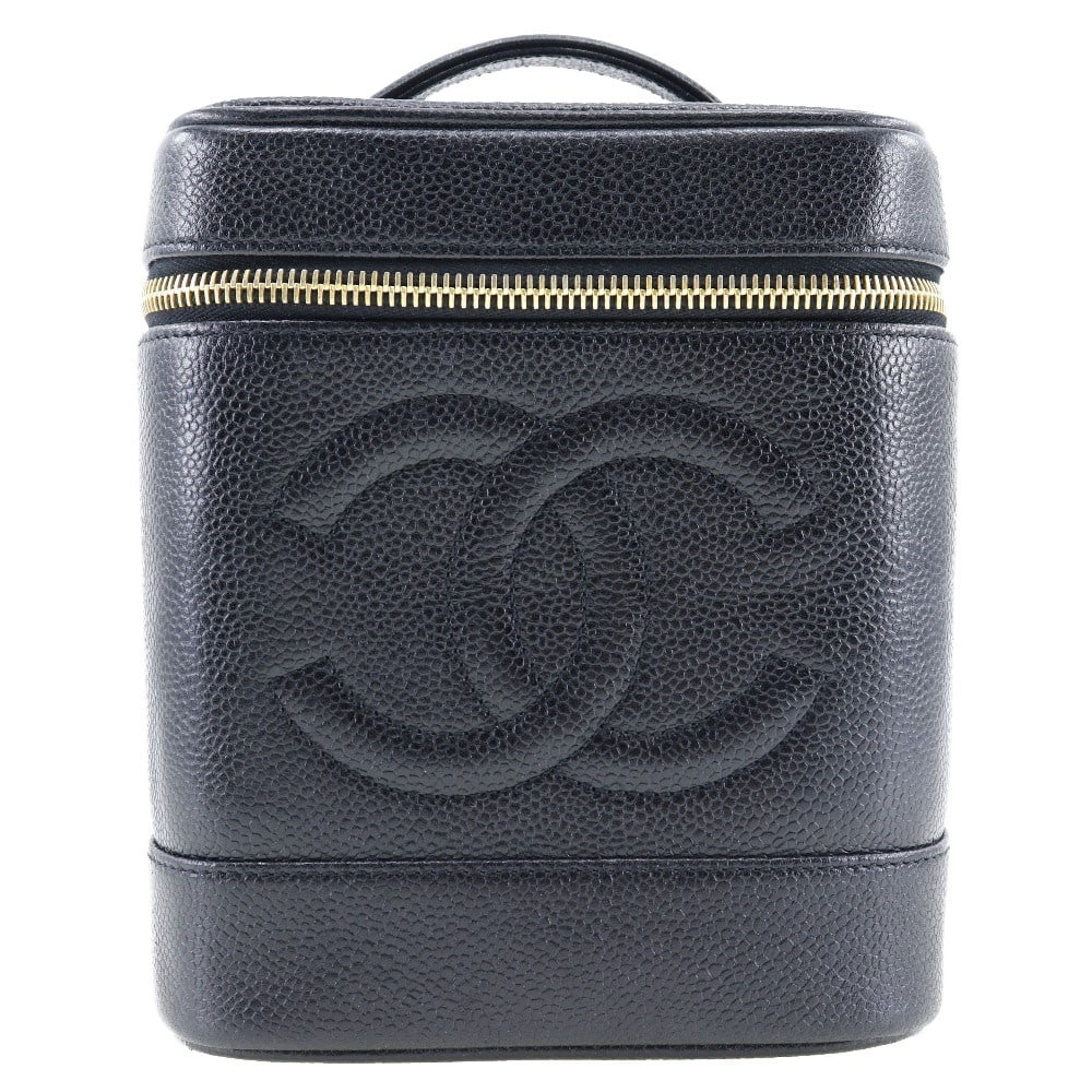 Chanel Black Leather Vintage Timeless Cosmetic Pouch: Chanel Black Leather Vintage Timeless Cosmetic Pouch This Chanel Vintage Timeless Cosmetic Case for women features black leather construction with a classic caviar texture. The compact case offers ele