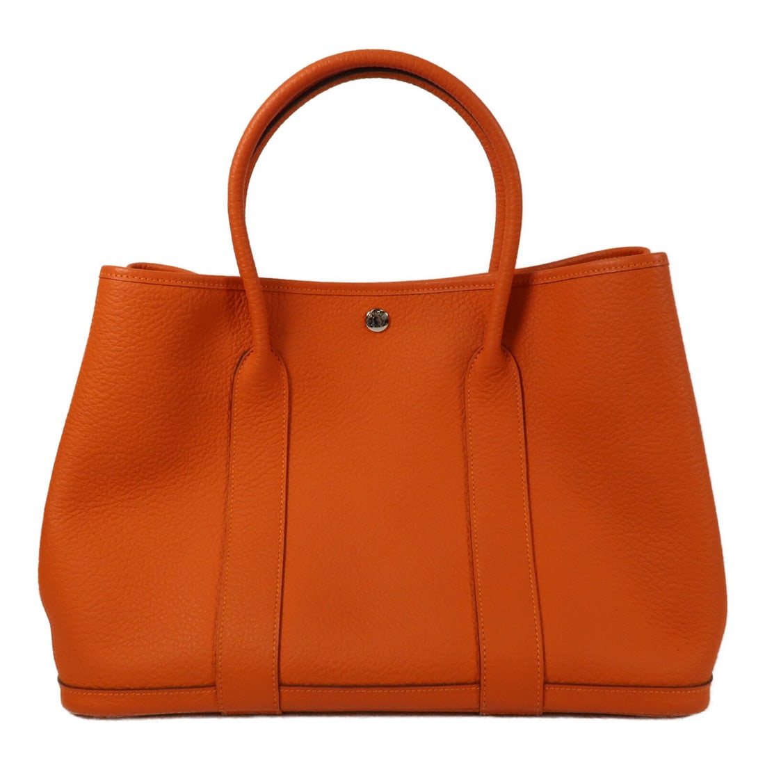 Hermes Garden Party PM Orange Calfskin Tote with Palladium Hardware: Hermes Garden Party PM Orange Calfskin Tote with Palladium Hardware This Hermes Garden Party PM tote bag is crafted from orange Negonda leather, offering a sophisticated and versatile accessory. Desig