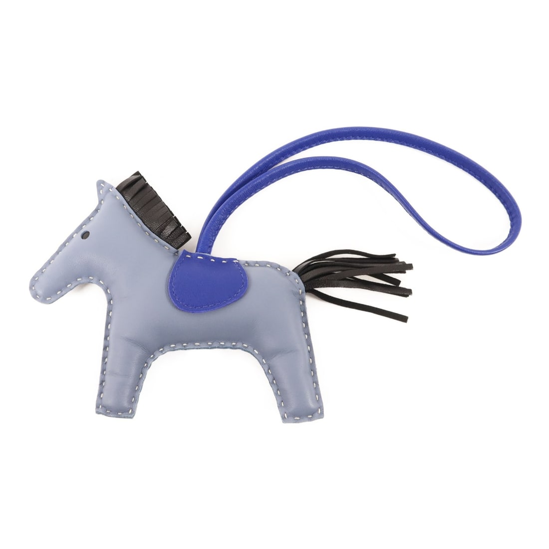 Hermes Rodeo MM Milo Lambskin Horse Bag Charm in Blue and Black: Hermes Rodeo MM Milo Lambskin Horse Bag Charm in Blue and Black This Hermes Rodeo MM Charm is crafted from Milo lambskin leather in shades of Bleu Lin, Bleu Electrique, and Noir. Designed for women, t