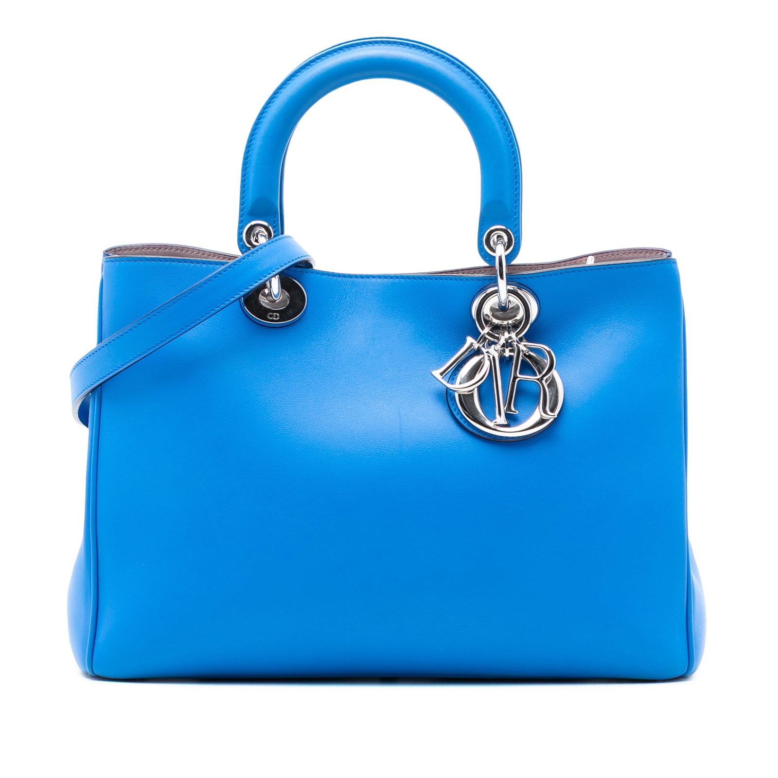 Dior Medium Blue Leather Diorissimo Tote with Shoulder Strap: Dior Medium Blue Leather Diorissimo Tote with Shoulder Strap This Medium Calfskin Diorissimo Tote features a leather body in blue, flat leather top handles, a removable flat leather shoulder strap, an