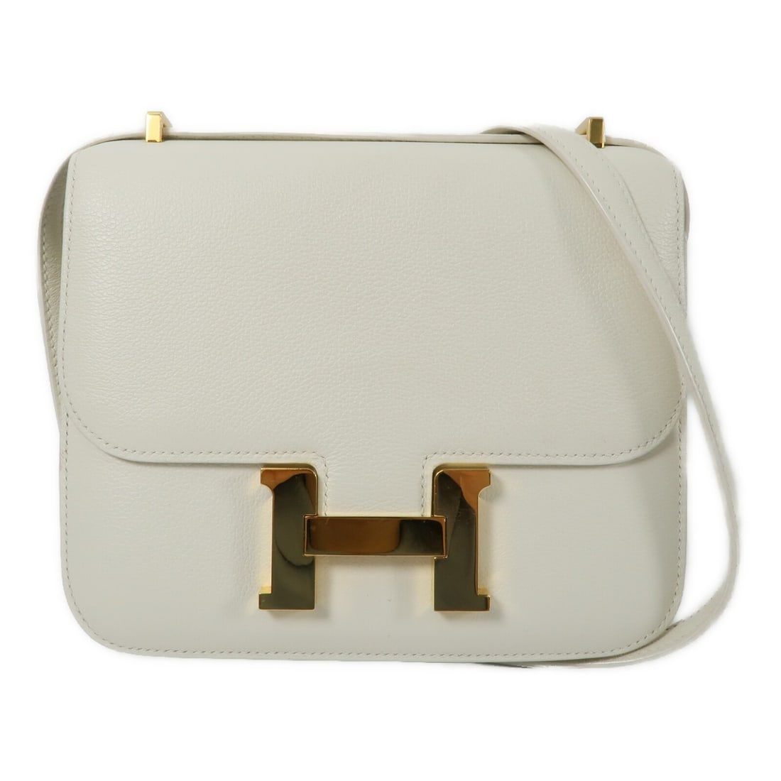 Hermes Constance Mini White Evercolor Leather Shoulder Bag with Gold Hardware: Hermes Constance Mini White Evercolor Leather Shoulder Bag with Gold Hardware This Hermes Constance Mini shoulder bag is crafted from Evercolor calfskin leather in a white hue. It features gold hardwa