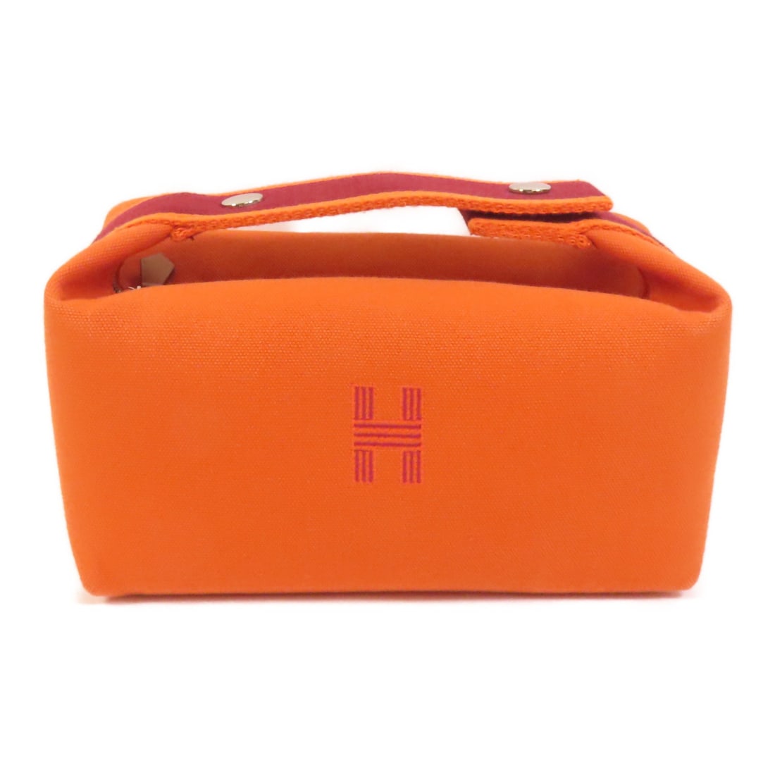 Hermes Bride A Brac Orange Canvas Handbag: Hermes Bride A Brac Orange Canvas Handbag This Hermes Bride A Brac handbag is crafted from orange canvas and features a compact design. Made in France, it offers a stylish and versatile accessory opti
