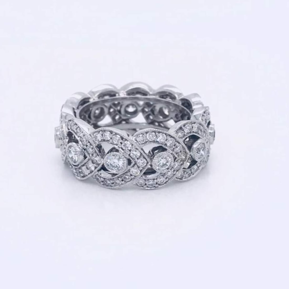 3.00 Ct VVS-VS Diamond Wedding Band in 18K White Gold: 3.00 Ct VVS-VS Diamond Wedding Band in 18K White Gold This exquisite 3.00 Ct Diamond Wedding Band features a stunning array of 132 diamonds, each weighing a total of 3.00 carats. The diamonds are of E