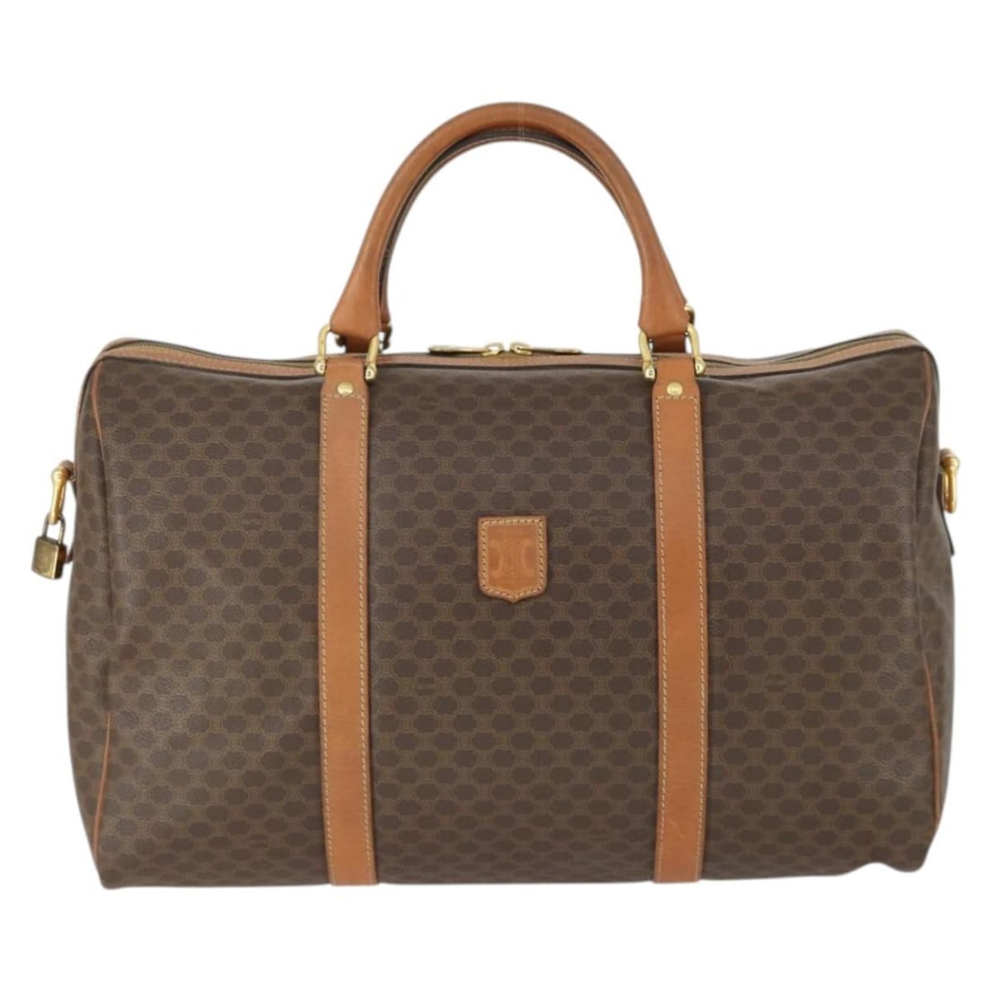 Celine Macadam Vintage Boston Bag in Brown Canvas and Leather: Celine Macadam Vintage Boston Bag in Brown Canvas and Leather This Celine Vintage Macadam Boston bag is crafted from durable brown PVC canvas with leather accents. Designed for women, it features a sp