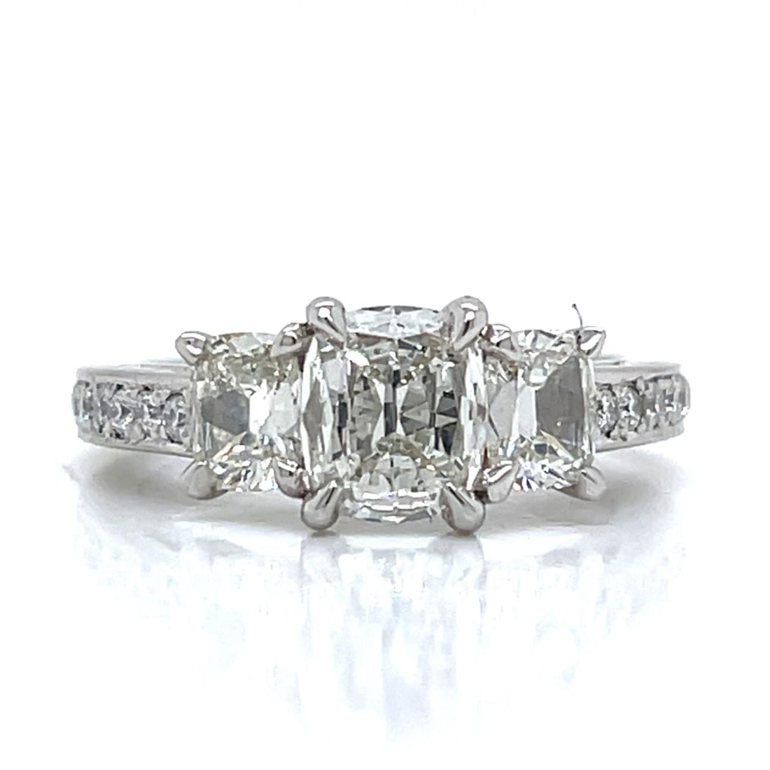 DAUSSI Platinum 2.40 Ct Diamond Ring with Cushion Cuts: DAUSSI Platinum 2.40 Ct Diamond Ring with Cushion Cuts This exquisite DAUSSI Platinum Diamond Ring features a stunning design with a center cushion-cut diamond weighing approximately 1.20 Ct. Flanking