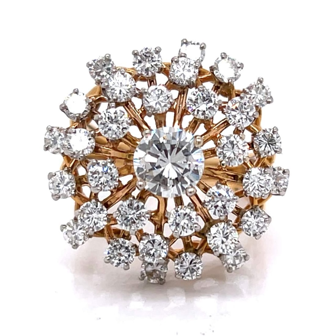 1960's 14K Yellow Gold 4.20 Ct Diamond Ring with 32 Stones: 1960's 14K Yellow Gold 4.20 Ct Diamond Ring with 32 Stones This stunning 1960's ring is crafted from 14K yellow gold and showcases a central diamond weighing approximately 1.00 Ct with H color and SI1