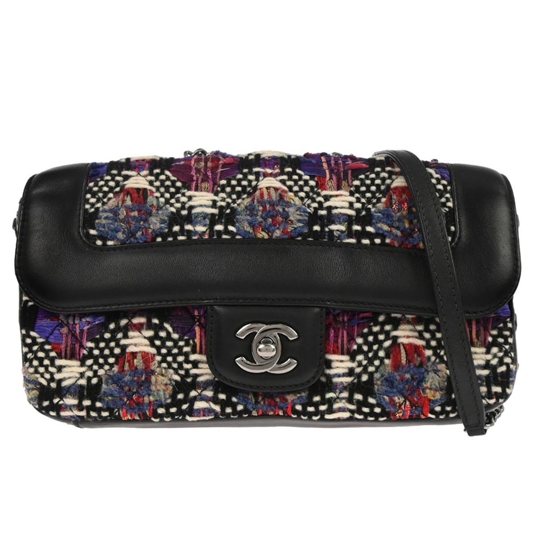 Coco Corset Small Flap Shoulder Bag in Black Tweed and Lambskin Leather: Coco Corset Small Flap Shoulder Bag in Black Tweed and Lambskin Leather This Chanel Coco Corset Flap Bag is crafted from black tweed and lambskin leather, featuring the iconic logo accent. Designed as