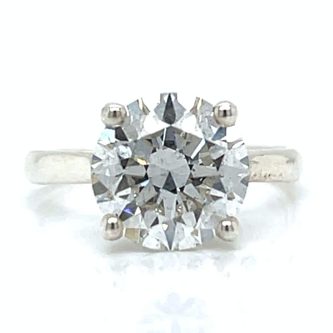 GIA Certified 4.02 Ct Round Diamond Ring G Color SI2: GIA Certified 4.02 Ct Round Diamond Ring G Color SI2 This exquisite diamond ring features a GIA Certified 4.02 Ct. round diamond, showcasing a stunning G color and SI2 clarity. Weighing 3.2 grams, thi