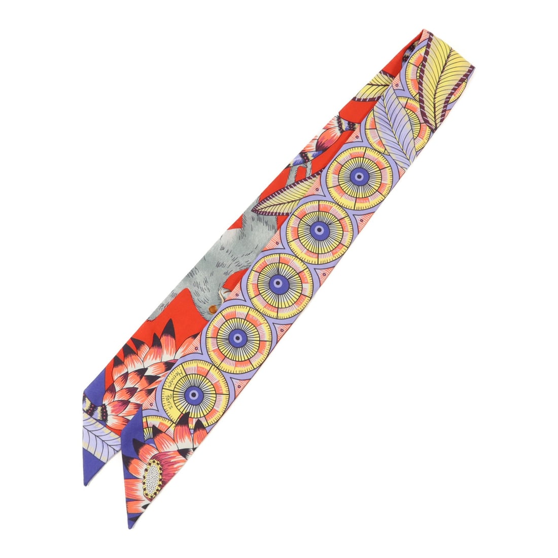 Hermes Twilly silk multicolor scarf: Hermes Twilly silk multicolor scarf This Hermes Twilly scarf is crafted from luxurious silk and features a vibrant multicolor design. Made in France, it is designed for women and offers a versatile ac