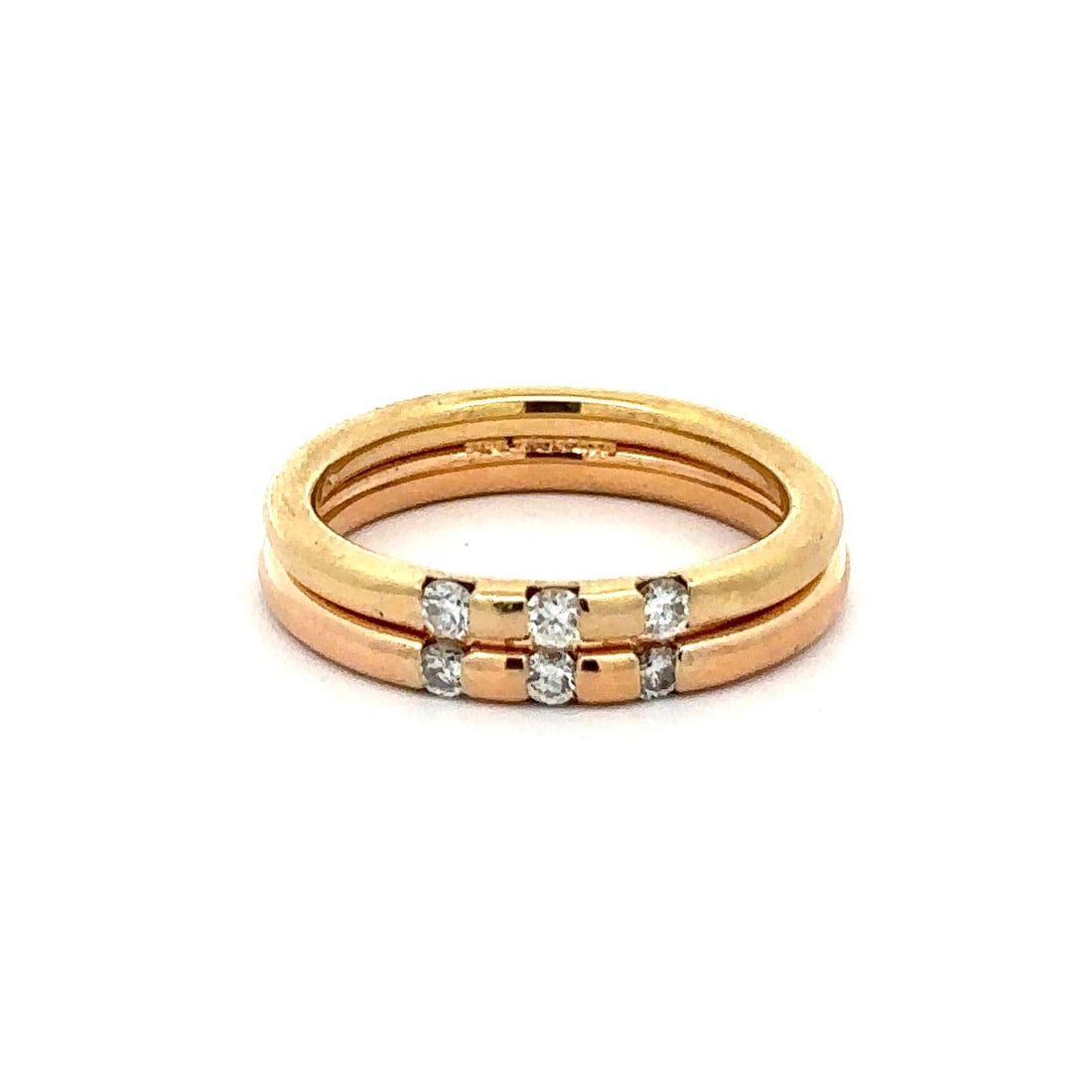 18k Two Tone Gold Diamond Dual Band Ring 0.24ctw: 18k Two Tone Gold Diamond Dual Band Ring 0.24ctw This exquisite 18k Two Tone Gold Ring features a stunning dual band stacked design, accentuated by three natural round brilliant cut diamonds totaling 