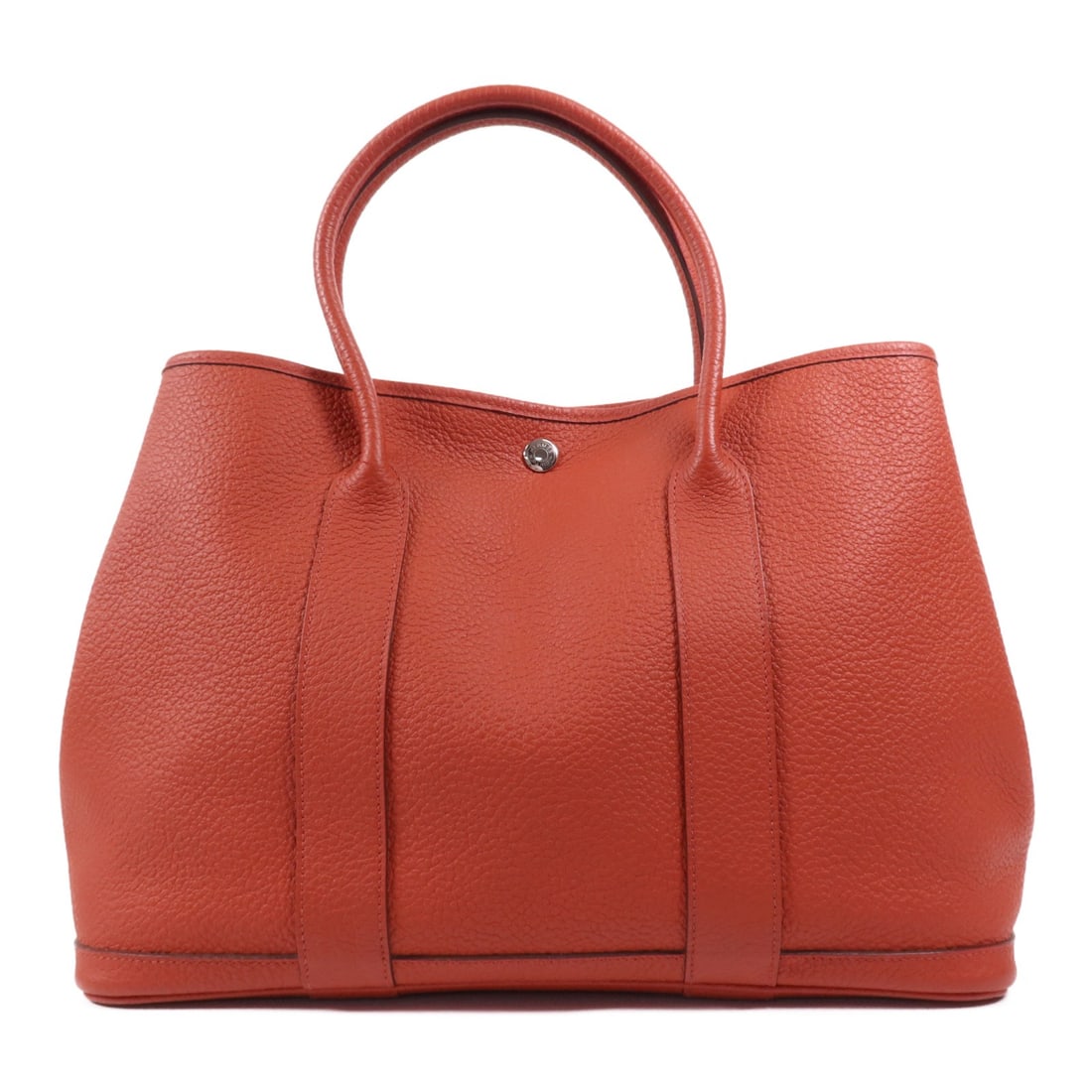 HERMES Garden Party PM Handbag Red Negonda Leather PHW: HERMES Garden Party PM Handbag Red Negonda Leather PHW Elevate your accessory collection with the HERMES Garden Party PM Handbag, crafted from high-quality calfskin leather in a striking red hue. This