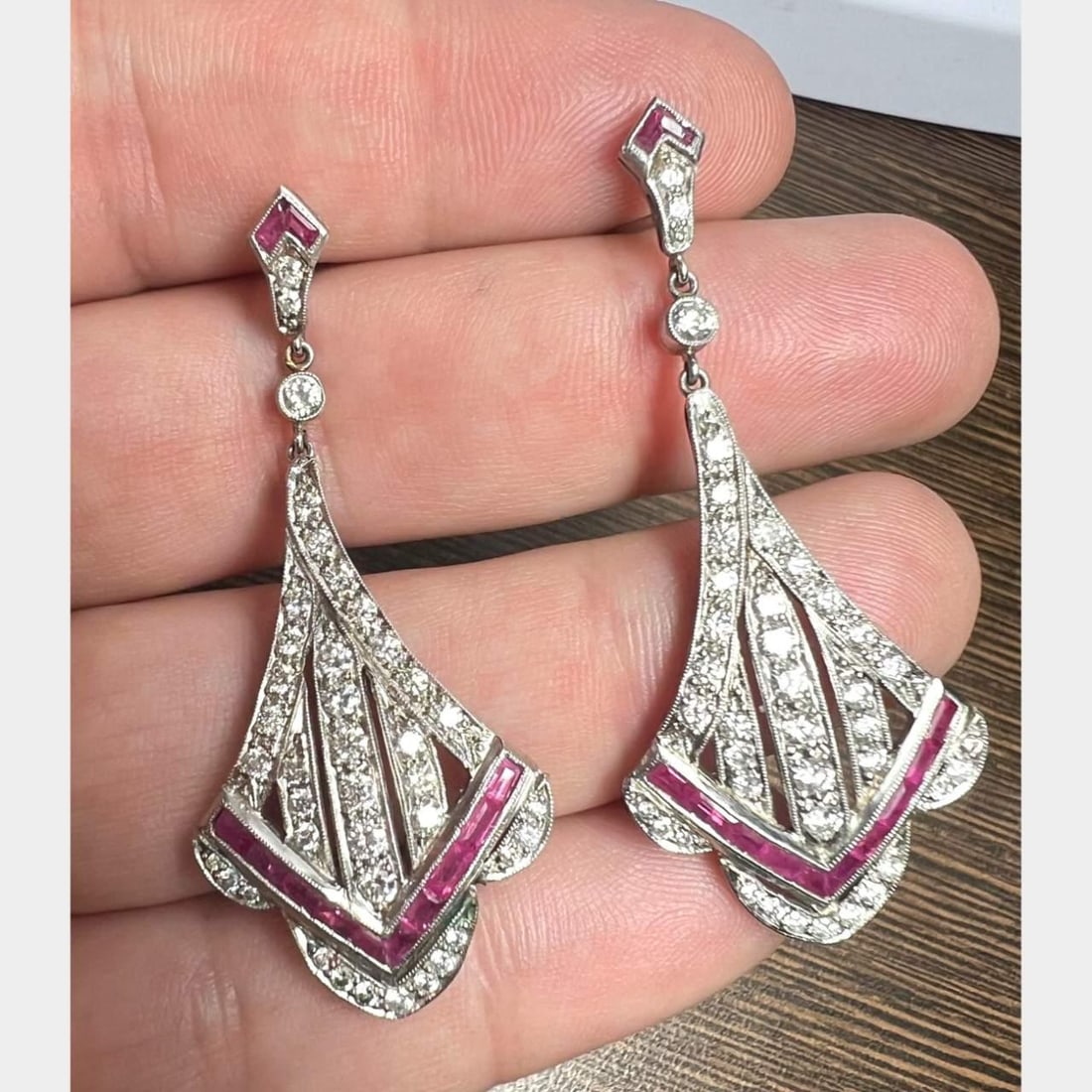 Platinum Earrings with 80 Diamonds 3.00 Ct and 24 Rubies 2.00 Ct: Platinum Earrings with 80 Diamonds 3.00 Ct and 24 Rubies 2.00 Ct These exquisite Platinum Ruby & Diamond Earrings are a stunning addition to any jewelry collection. Crafted from high-quality platinum,