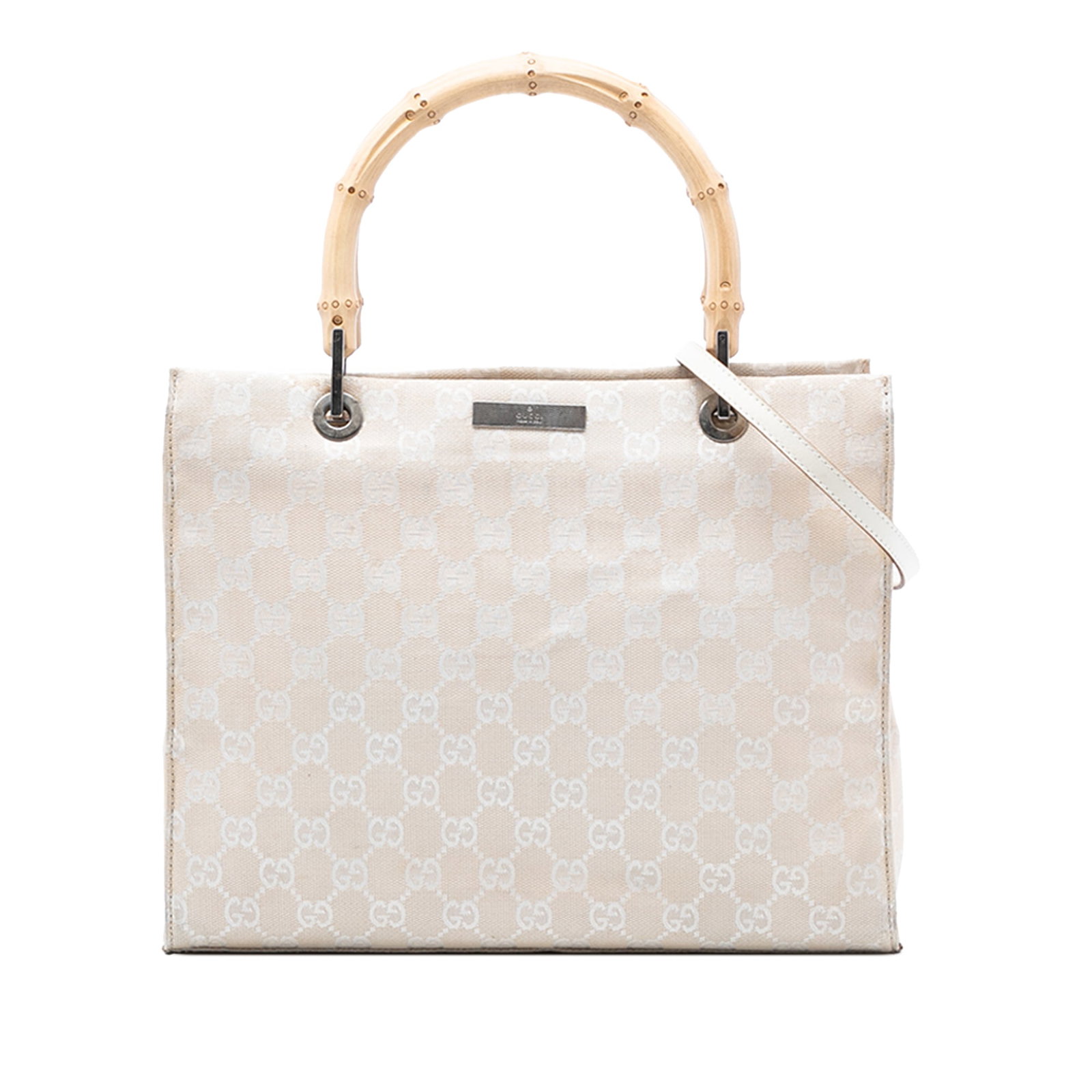 Brown GG Canvas Satchel with Bamboo Handles by Gucci: Brown GG Canvas Satchel with Bamboo Handles by Gucci This Gucci GG Canvas Bamboo Satchel features a brown canvas body with distinctive bamboo handles. The bag offers an open top, interior zip and slip