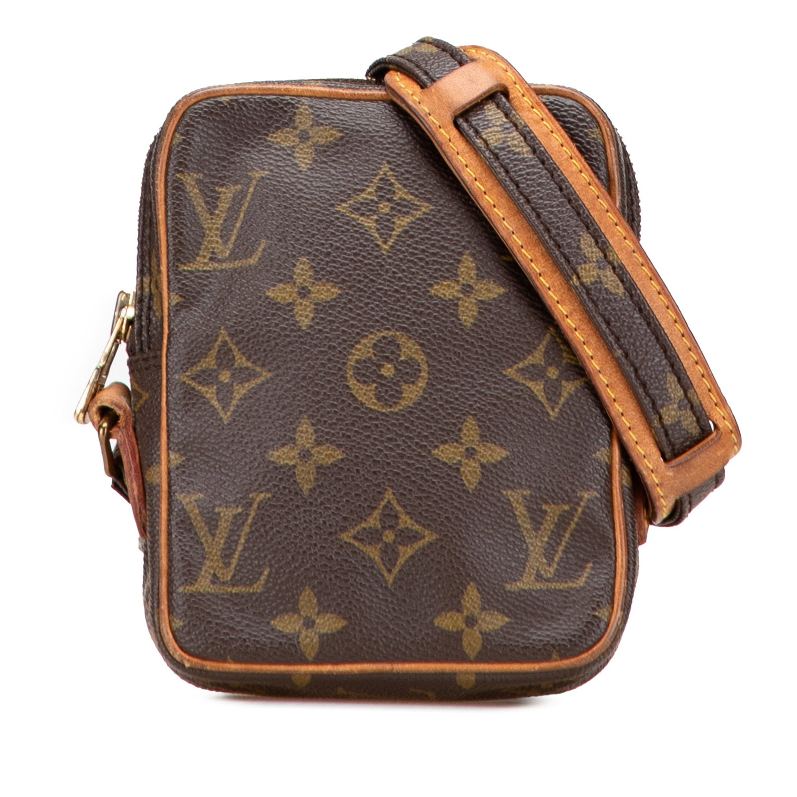 Louis Vuitton Monogram Mini Danube Crossbody Bag Brown Canvas: Louis Vuitton Monogram Mini Danube Crossbody Bag Brown Canvas The Louis Vuitton Monogram Mini Danube is a stylish and compact bag that showcases the iconic monogram canvas complemented by vachetta lea