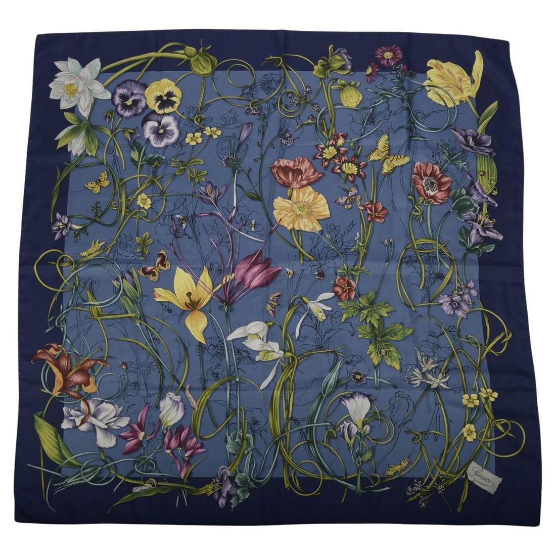 Floral Print Silk Square Scarf by Gucci in Blue Tones: Floral Print Silk Square Scarf by Gucci in Blue Tones This Gucci Flora silk scarf features a blue floral design and is crafted from high-quality silk. Made in Italy, it showcases the brand's iconic pa