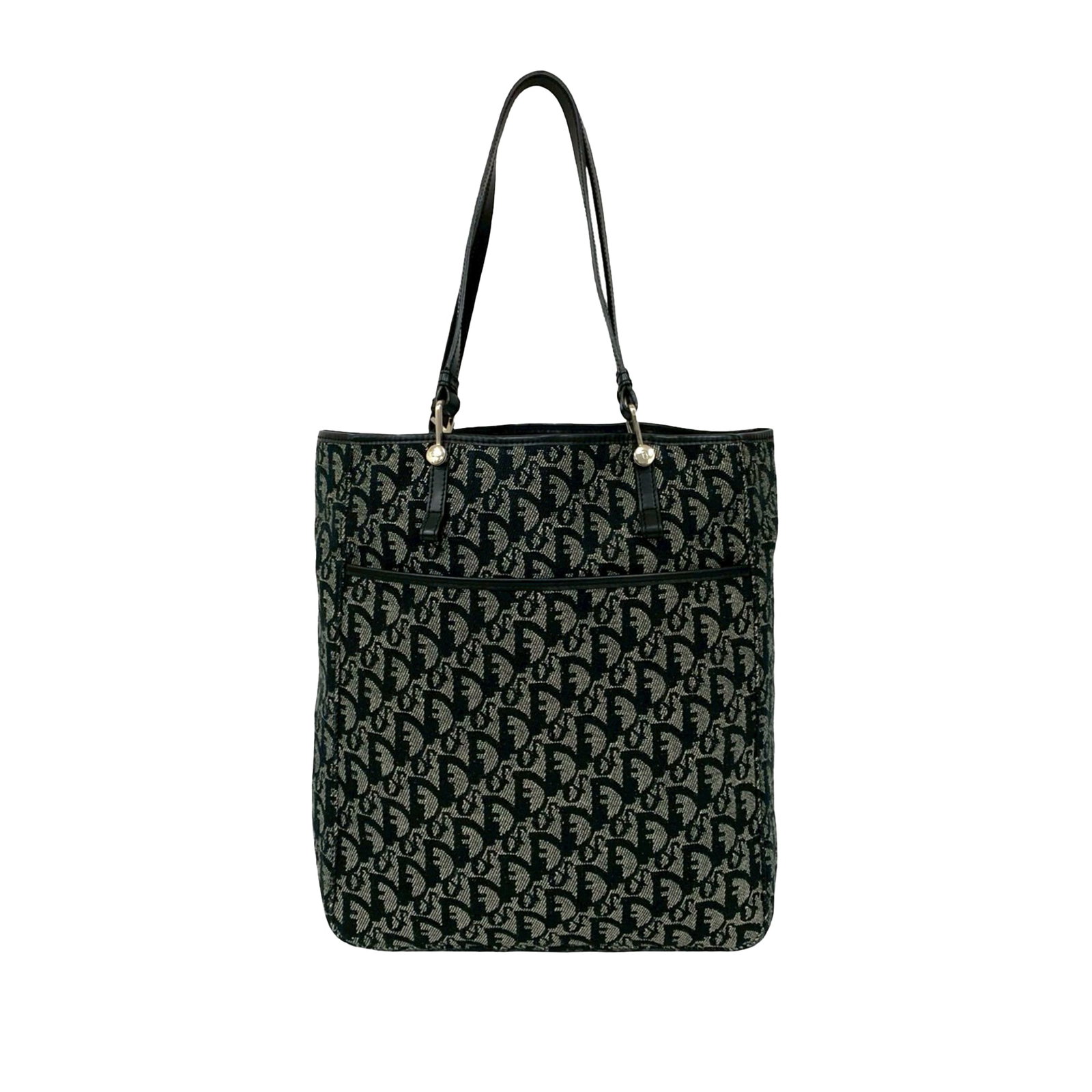 Dior Diorissimo Trotter Canvas Tote Bag with Leather Trim: Dior Diorissimo Trotter Canvas Tote Bag with Leather Trim This Diorissimo Trotter Canvas Tote features a durable canvas body with leather trim, flat leather straps, an open top, an exterior front slip