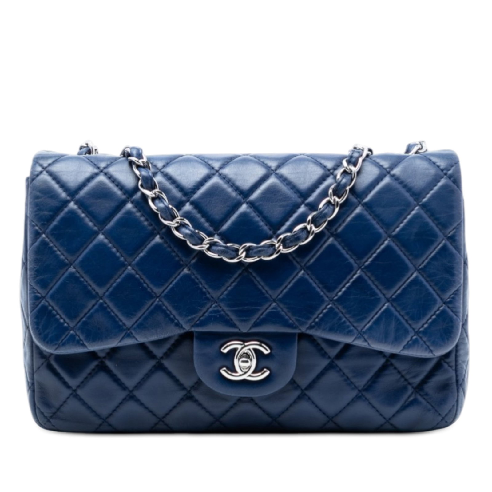 Blue Chanel Lambskin Quilted Jumbo Shoulder Bag with CC Turnlock: Blue Chanel Lambskin Quilted Jumbo Shoulder Bag with CC Turnlock This Chanel Jumbo Classic Lambskin Single Flap shoulder bag features a quilted lambskin leather body with leather-woven chain straps, d