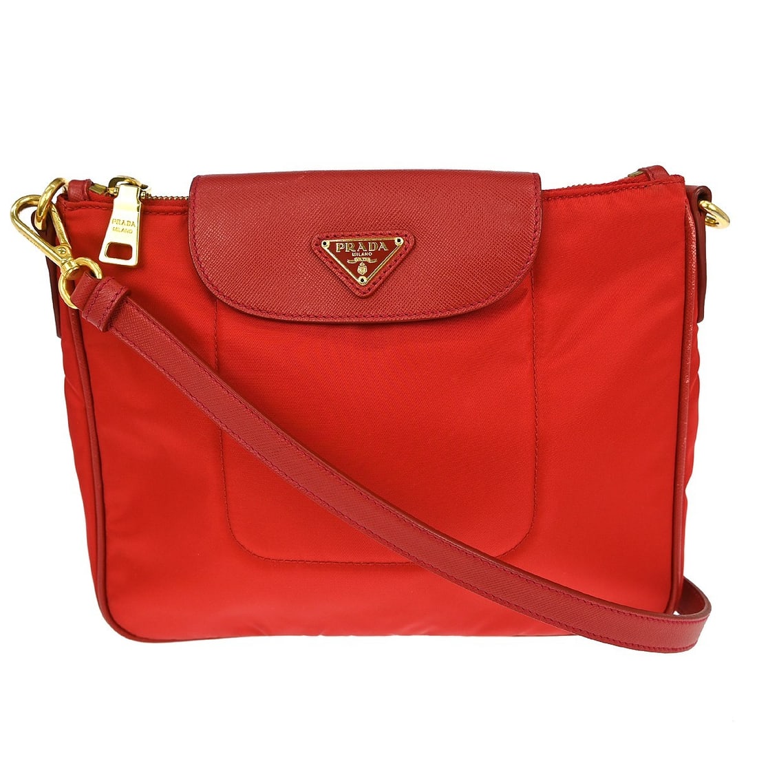Prada Small Red Nylon Shoulder Bag with Logo Accent: Prada Small Red Nylon Shoulder Bag with Logo Accent This Prada shoulder bag features a striking red nylon exterior with a matching red handle or strap. Designed in a small size, it is ideal for casual