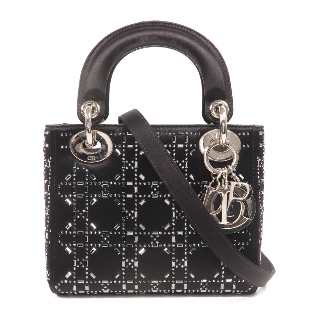 Dior Satin Black 2 Way Shoulder Bag: Dior Satin Black 2 Way Shoulder Bag This Christian Dior 2-way shoulder bag features a sleek black satin exterior and offers versatile styling options. Designed for women, the bag is crafted with a com