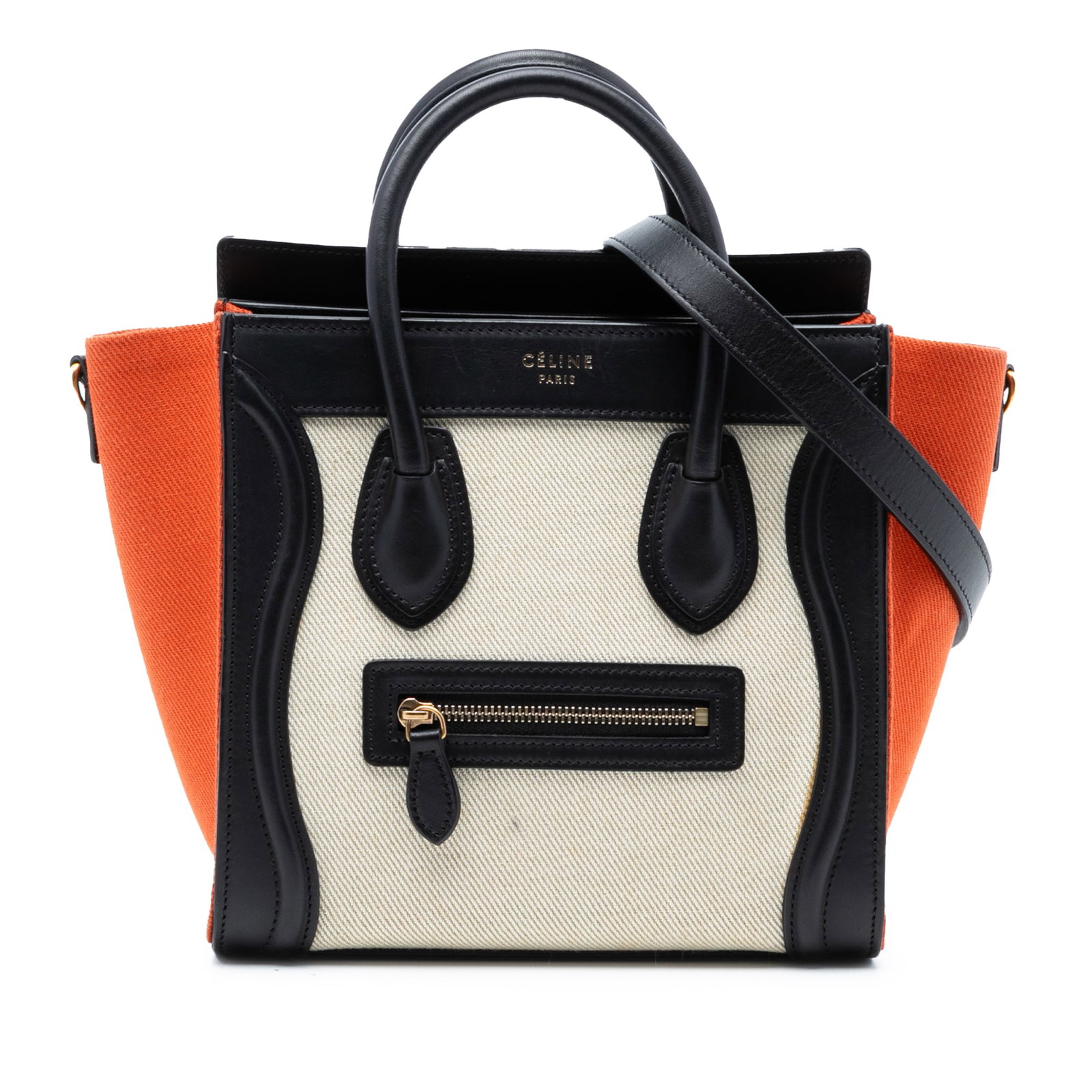 Nano Luggage Tote by Celine in Tricolor Canvas and Leather: Nano Luggage Tote by Celine in Tricolor Canvas and Leather This Celine Nano Tricolor Luggage Tote features a canvas body with leather trim, complemented by rolled leather handles and a detachable flat