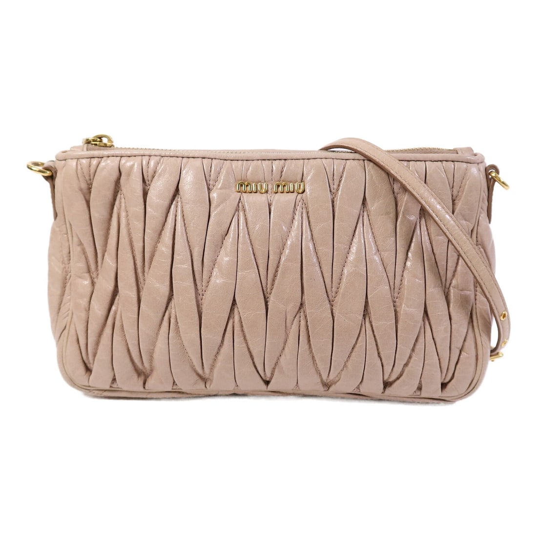 Miu Miu Beige Calfskin GHW Shoulder Bag: Miu Miu Beige Calfskin GHW Shoulder Bag This Miu Miu shoulder bag is crafted from beige calfskin leather, offering a sophisticated and timeless look. Designed for women, the bag features a structured 