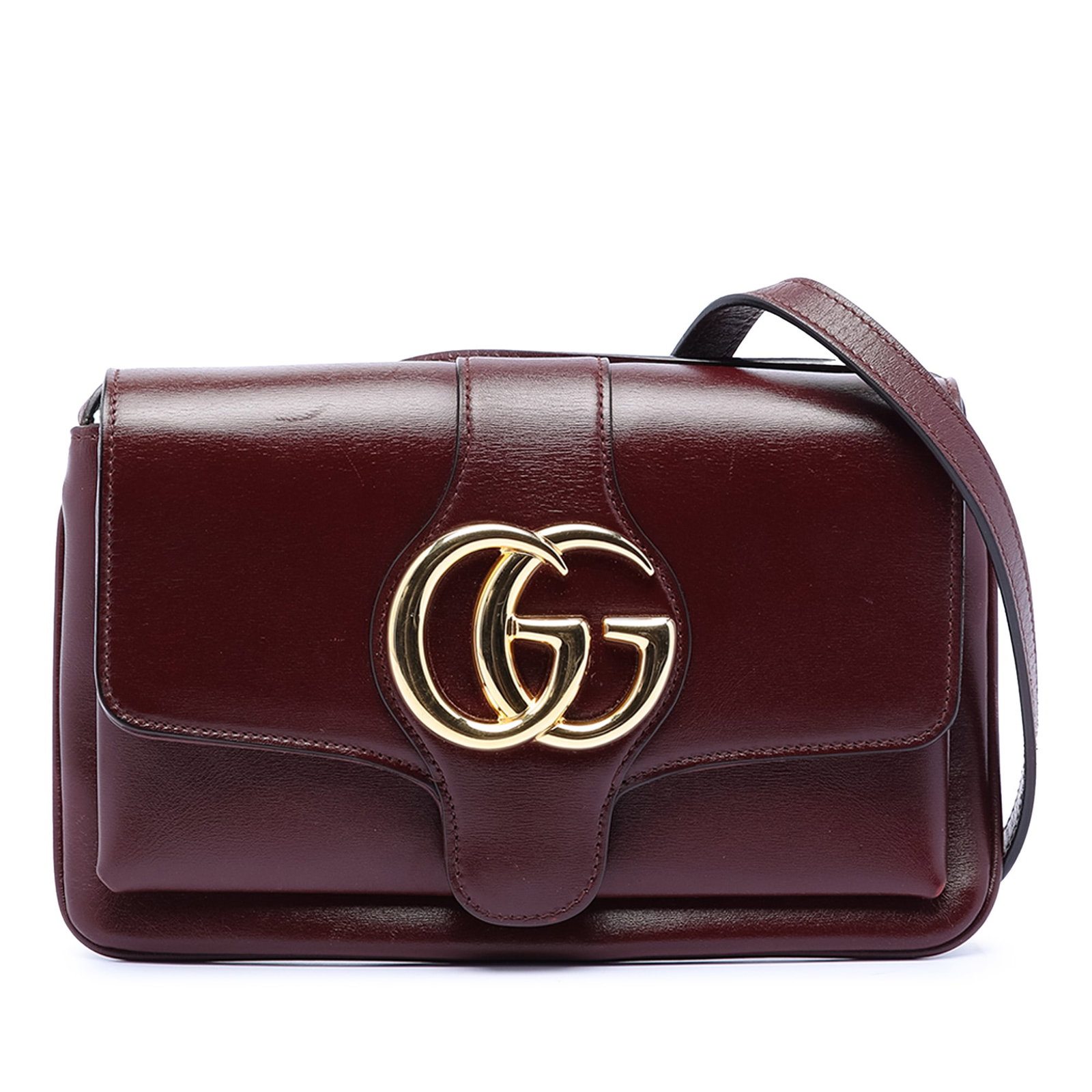 Red Leather Arli Small Crossbody Bag by Gucci Adjustable Strap: Red Leather Arli Small Crossbody Bag by Gucci Adjustable Strap This Gucci Small Leather Arli Crossbody bag features a red leather body with an adjustable flat leather strap. The design includes a fron