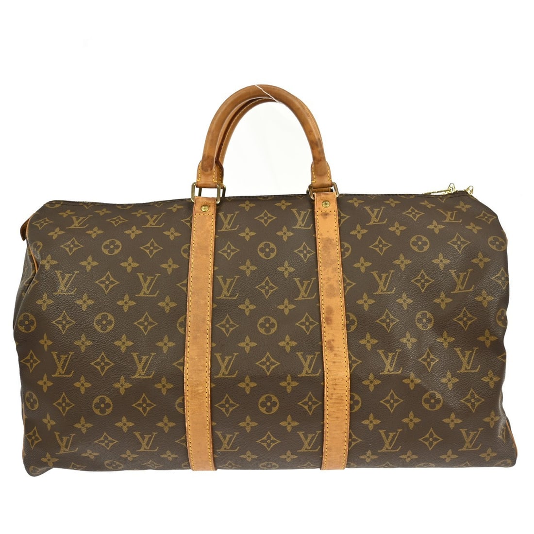 Louis Vuitton Keepall Monogram Brown Canvas Unisex Travel Bag: Louis Vuitton Keepall Monogram Brown Canvas Unisex Travel Bag This Louis Vuitton Keepall Bag features the iconic monogram canvas in brown, designed for unisex use. The bag has visible signs of use, in