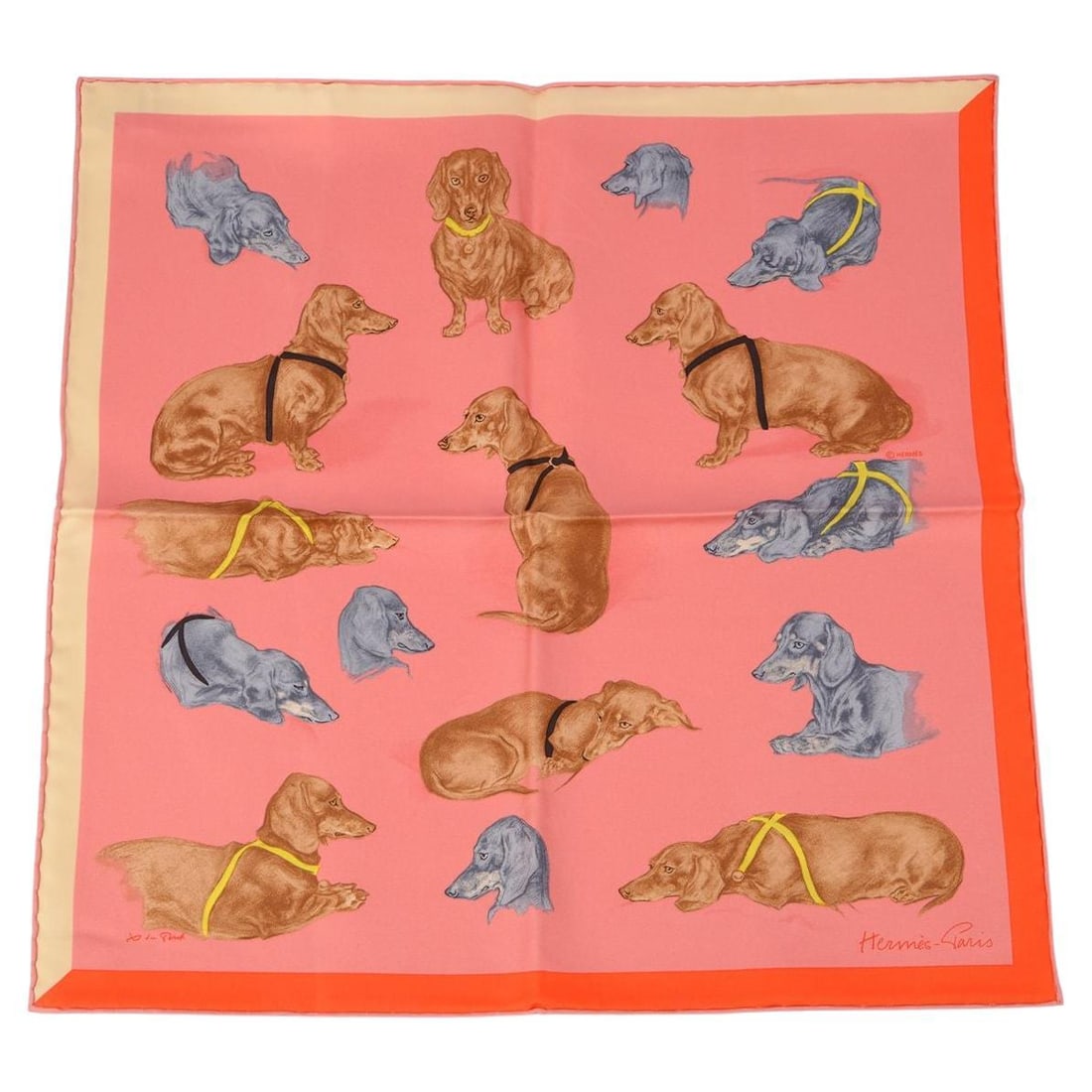 Hermes Les Bassets pink silk scarf by Xavier de Poret in box: Hermes Les Bassets pink silk scarf by Xavier de Poret in box Hermes "Les Bassets" scarf is crafted from 100% silk in a pink coral colorway, featuring hand-rolled edges. Designed by animal artist Xavie