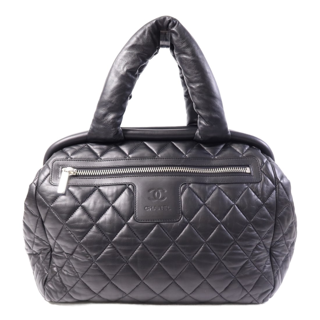 Black Calfskin Coco Cocoon CC Shoulder Bag by Chanel: Black Calfskin Coco Cocoon CC Shoulder Bag by Chanel This Chanel Coco Cocoon handbag features luxurious black calfskin leather and silver-tone hardware. Made in France, it offers a spacious interior s