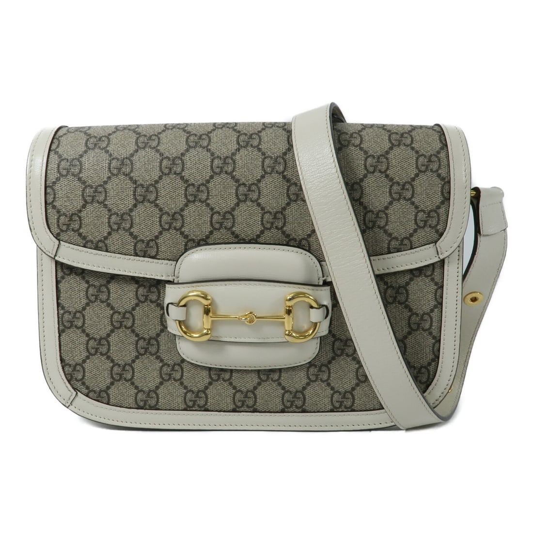Gucci Horsebit 1955 Beige Coated Canvas Shoulder Bag: Gucci Horsebit 1955 Beige Coated Canvas Shoulder Bag This Gucci Horsebit 1955 medium shoulder bag features a beige PVC coated canvas exterior and is designed in a classic shoulder bag style. Made in I