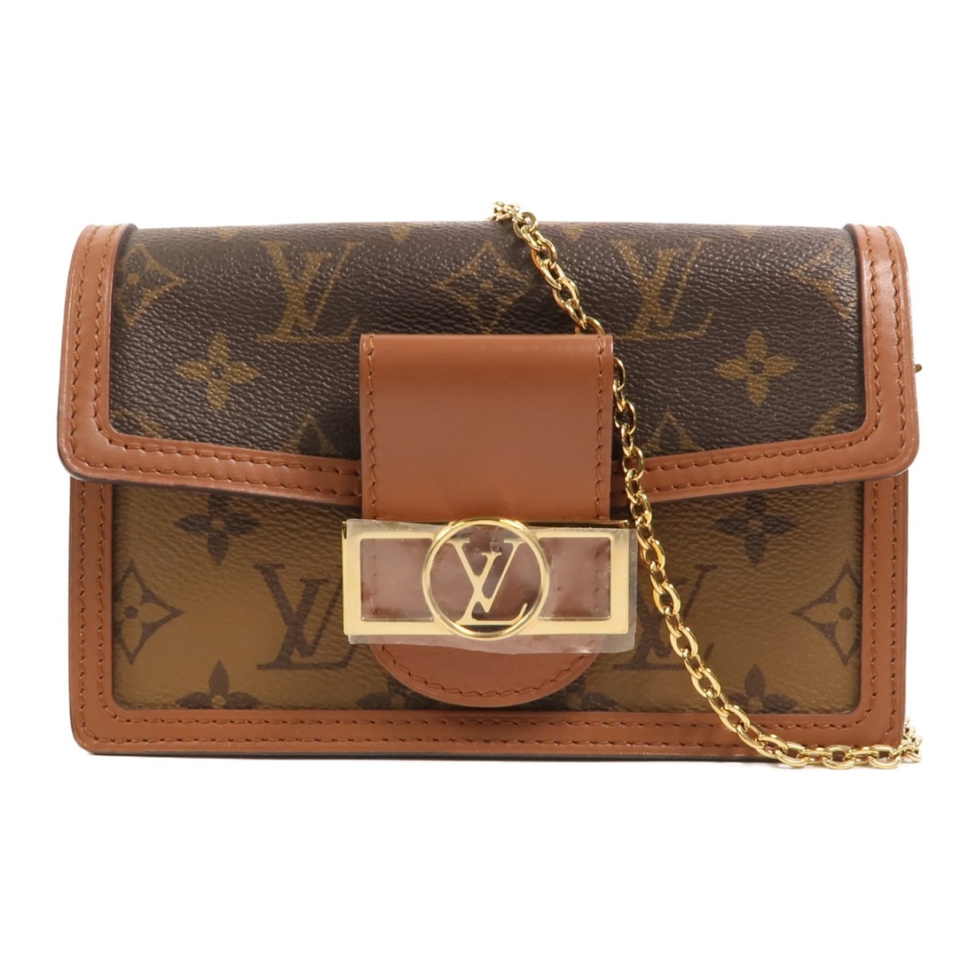 Louis Vuitton Dauphine Chain Shoulder Bag Monogram Reverse Brown GHW: Louis Vuitton Dauphine Chain Shoulder Bag Monogram Reverse Brown GHW This Louis Vuitton Dauphine chain shoulder bag features the iconic Monogram Reverse pattern in brown PVC coated canvas. Designed fo