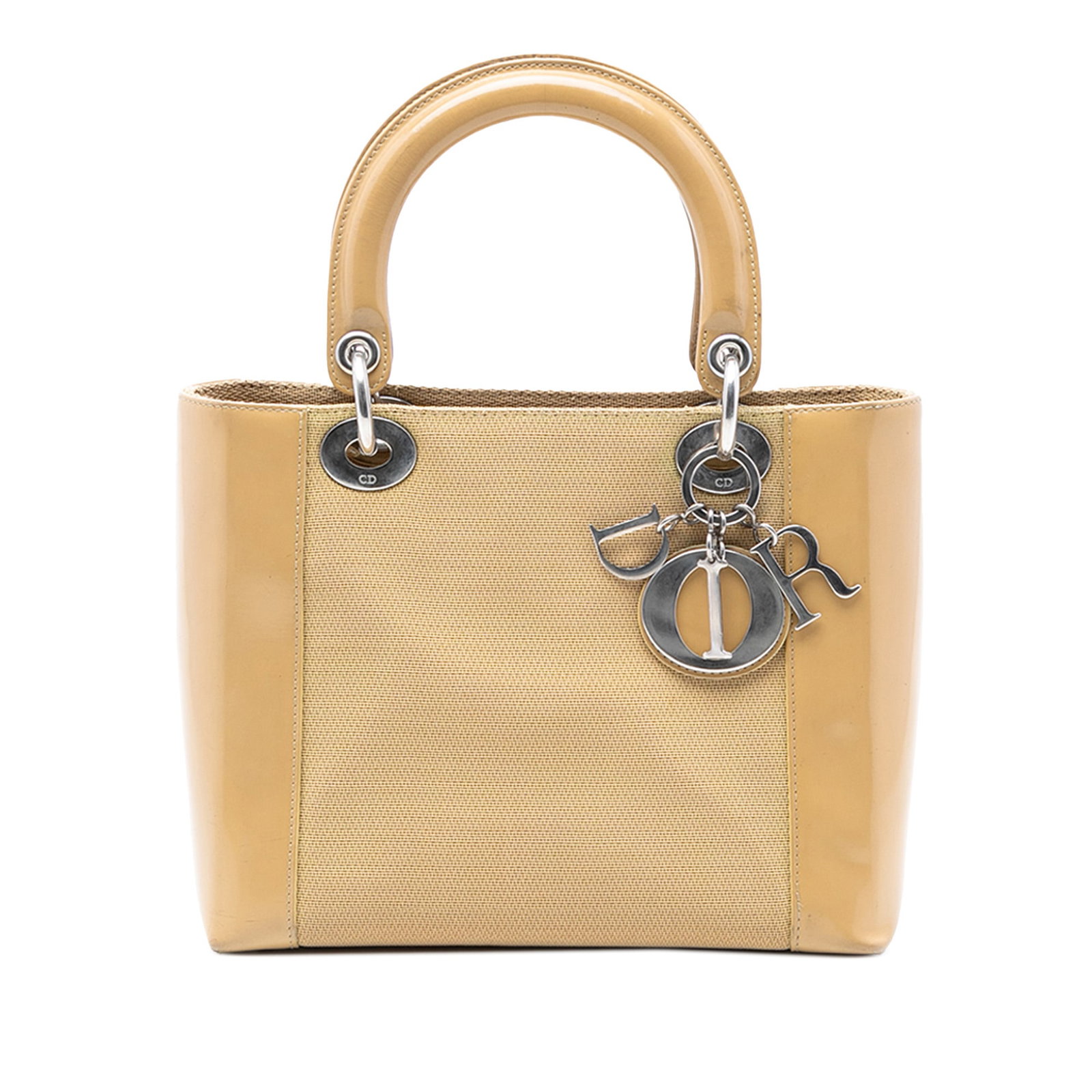 Dior Lady Dior Medium Handbag in Canvas with Patent Leather Sides: Dior Lady Dior Medium Handbag in Canvas with Patent Leather Sides This Lady Dior handbag features a beige canvas body with patent leather side panels, rolled handles, a top zip closure, and an interio