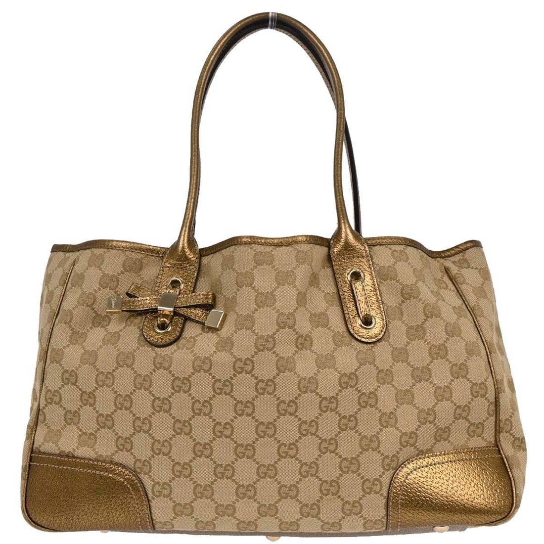 Gucci Vintage Beige Gold GG Tote Bag 163805 002404: Gucci Vintage Beige Gold GG Tote Bag 163805 002404 This stylish Gucci Beige Gold GG Tote Bag is a vintage piece featuring the iconic Gucci GG pattern. Crafted from a combination of canvas and leather,