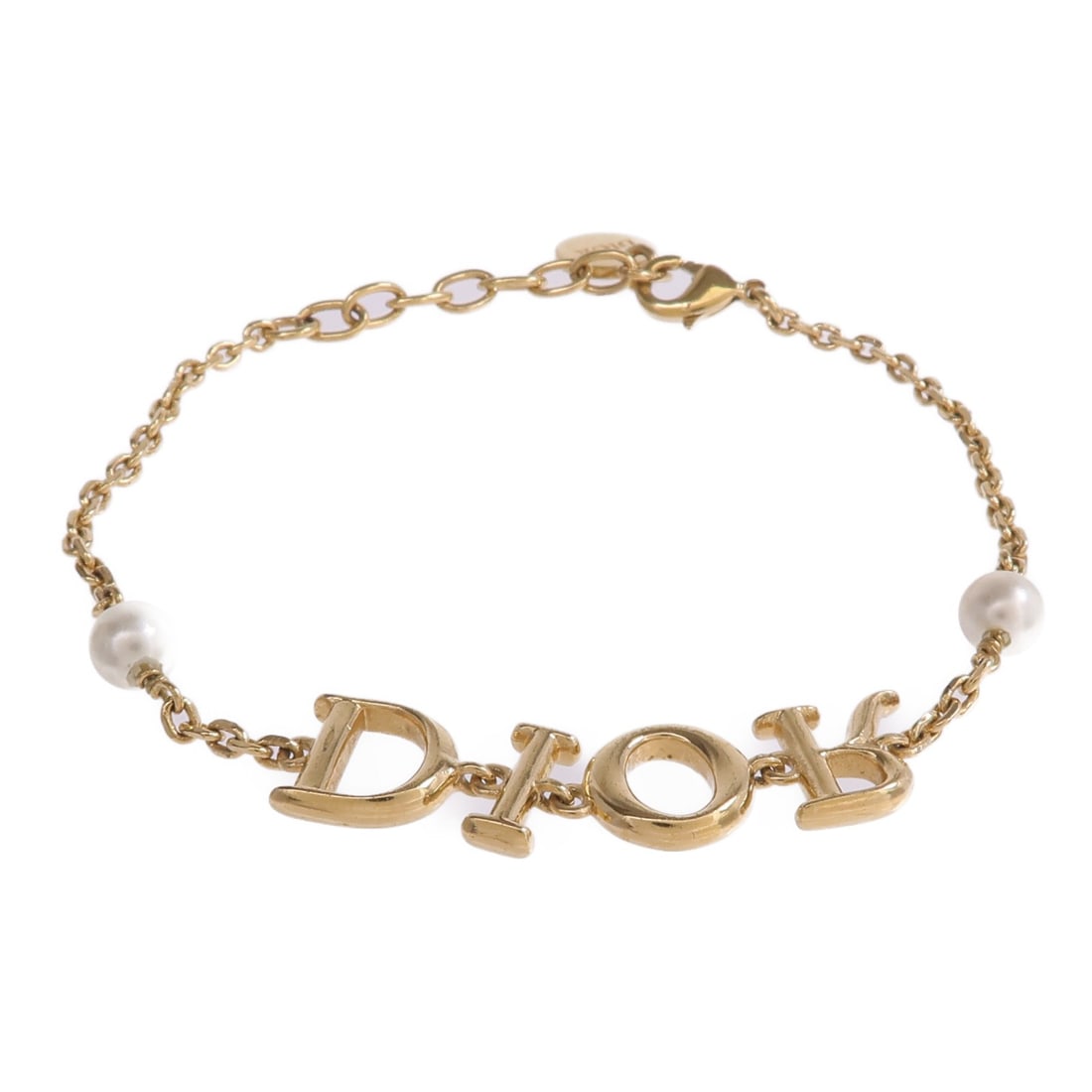 Dior Dio(r)evolution Gold Metal Bracelet: Dior Dio(r)evolution Gold Metal Bracelet This Christian Dior Dio(r)evolution bracelet showcases a gold-tone finish and is crafted from metal. Designed for women, it features a sleek, modern style with