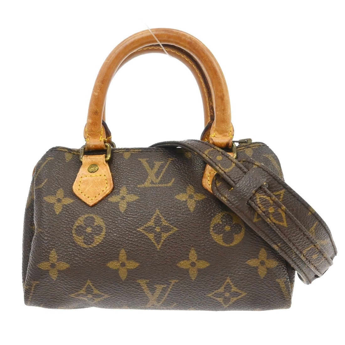 Louis Vuitton Speedy Mini Monogram Canvas Handbag M41534: Louis Vuitton Speedy Mini Monogram Canvas Handbag M41534 This Louis Vuitton Mini Speedy handbag features the iconic monogram canvas leather exterior in brown. Designed in a compact mini size, it inclu