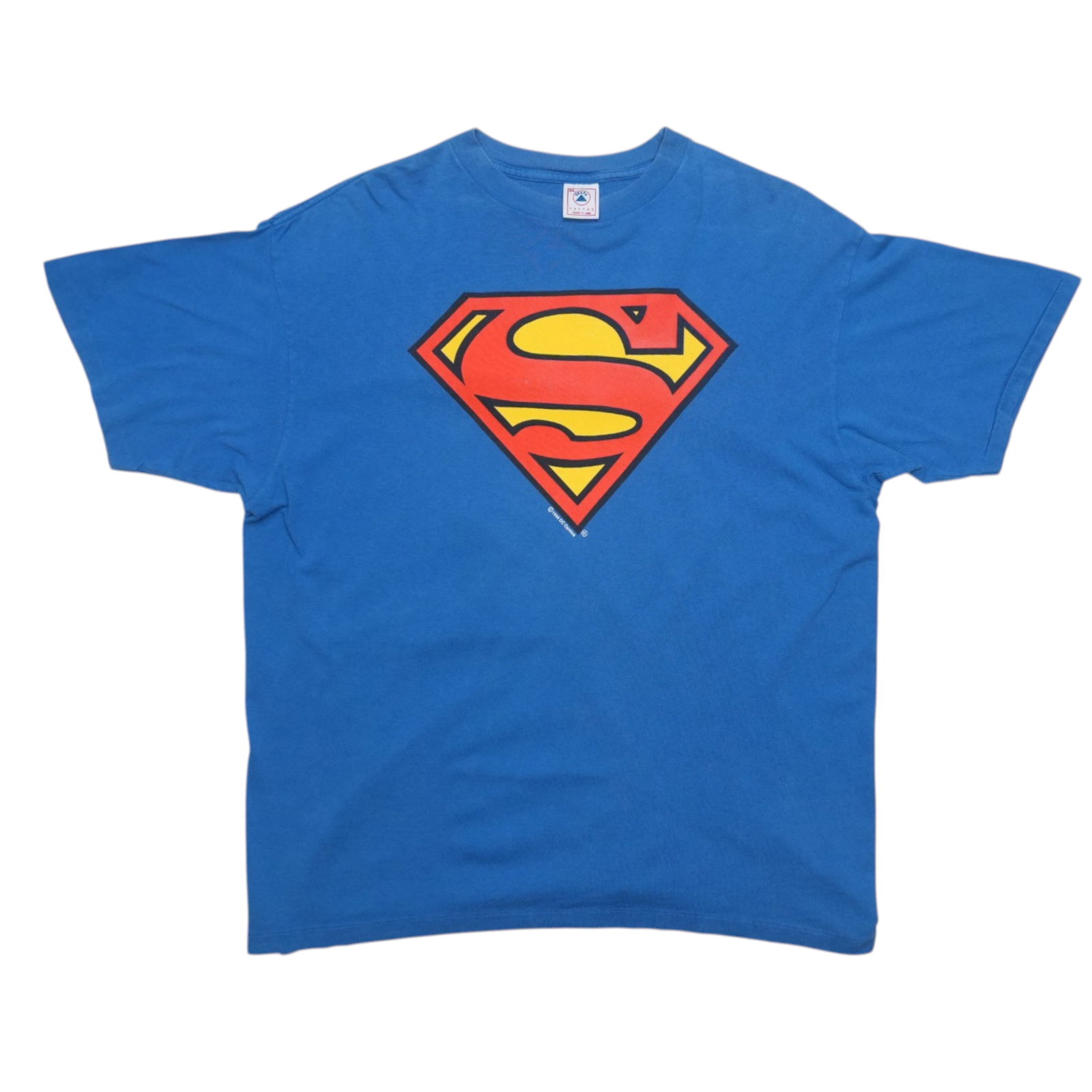 Vintage 1990s Superman Graphic Blue Cotton T-Shirt Extra Large: Vintage 1990s Superman Graphic Blue Cotton T-Shirt Extra Large This is an original vintage 1990s Superman DC Comics shirt featuring a front graphic. The shirt is made from 100% cotton and comes in blu