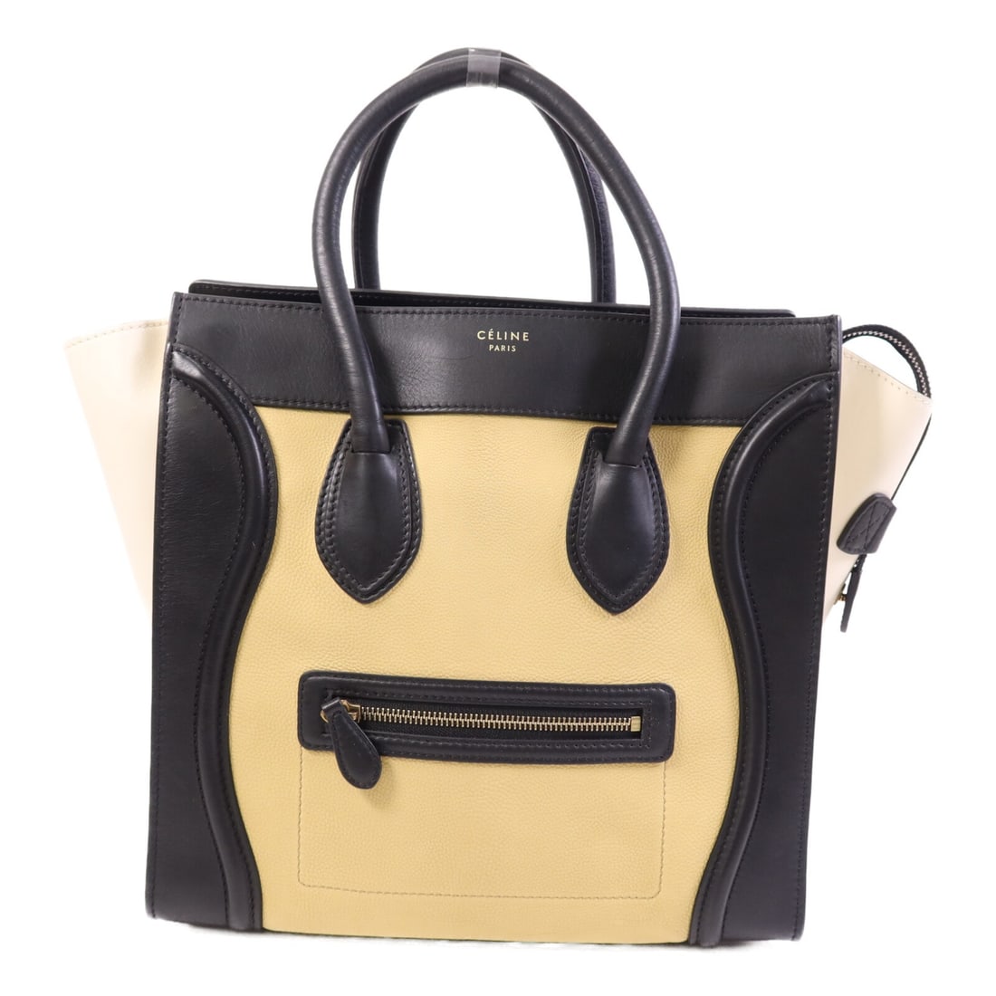 Mini Luggage Calfskin Handbag by CELINE Yellow and Black GHW: Mini Luggage Calfskin Handbag by CELINE Yellow and Black GHW This CELINE Mini Luggage handbag features premium calfskin leather in a striking yellow and black color combination. Crafted in France, the