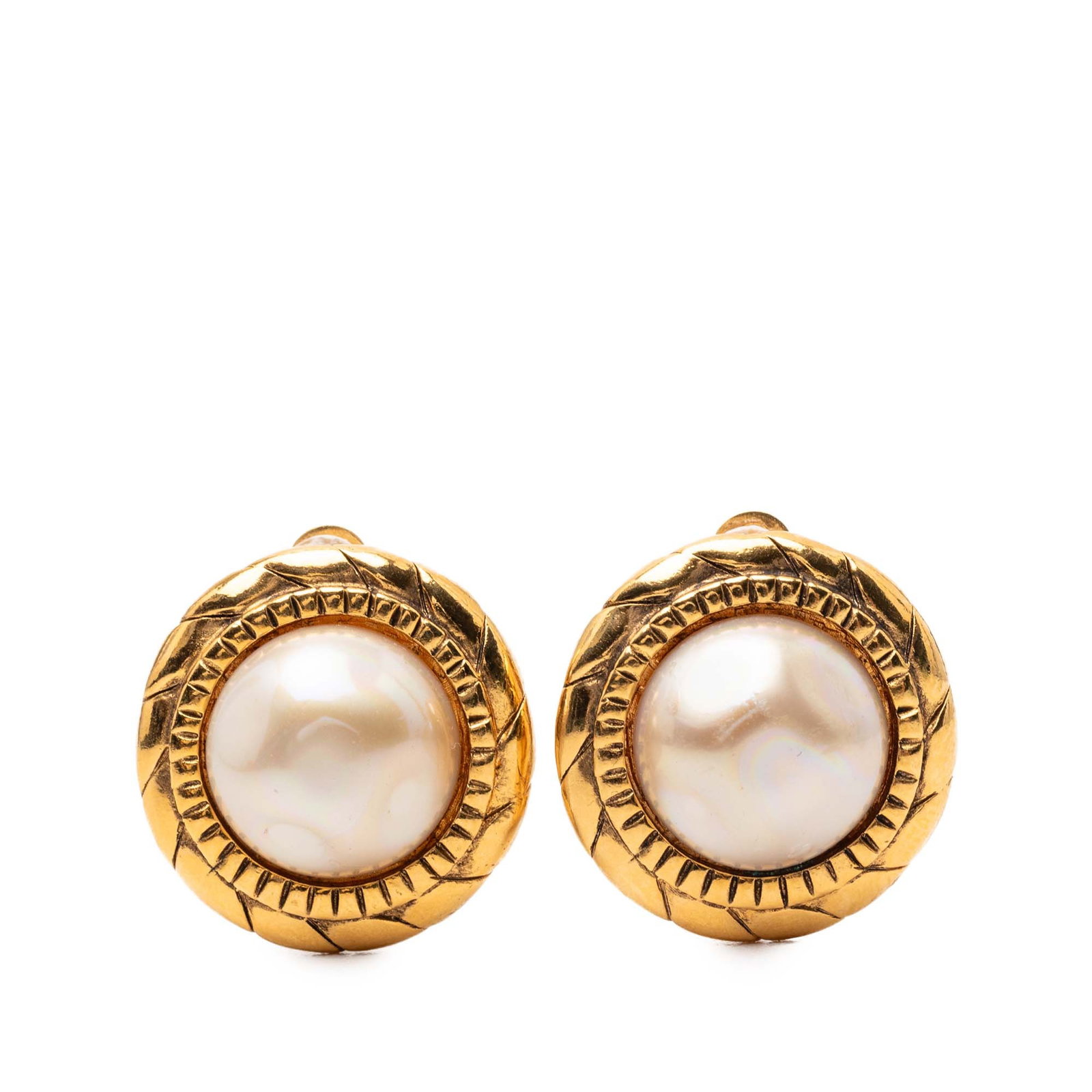 Chanel Round Clip Earrings with Gold Plating and Faux Pearl Accents: Chanel Round Clip Earrings with Gold Plating and Faux Pearl Accents These Chanel clip-on earrings feature gold-plated metal bodies adorned with round faux pearls. Designed in a classic round shape, th