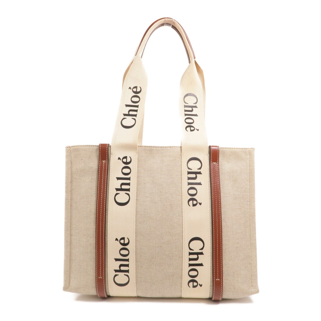 Chloe Medium Beige Canvas Tote Bag: Chloe Medium Beige Canvas Tote Bag This Chloe Woody Medium Tote Bag features a beige canvas exterior, offering a stylish and versatile accessory for everyday use. Designed for women, the bag combines 