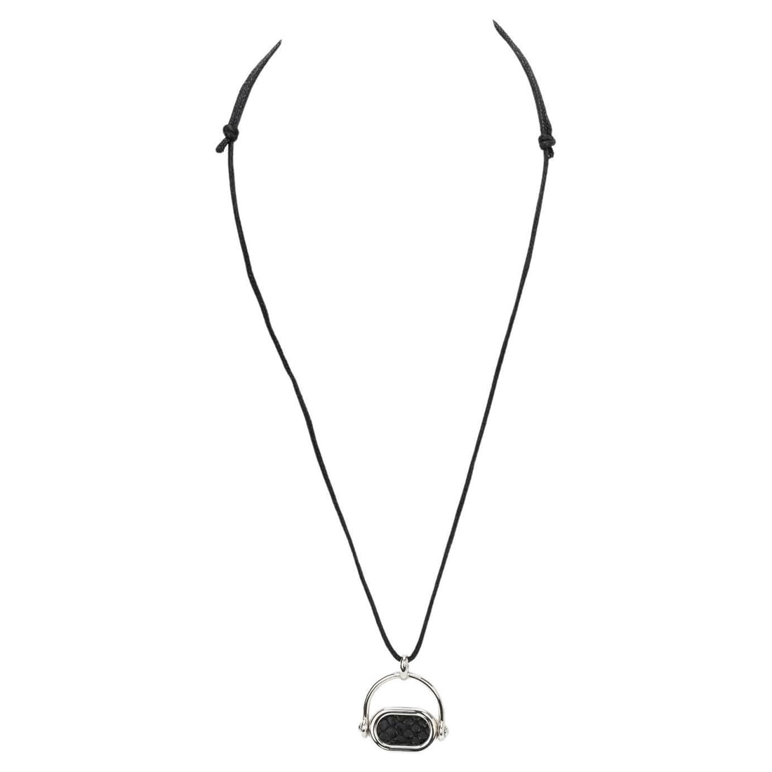Hermes Silver Necklace with Black Snake Skin Pendant 2018: Hermes Silver Necklace with Black Snake Skin Pendant 2018 This exquisite Hermes necklace features a stunning pendant crafted from silver palladium, showcasing the brand's name elegantly inscribed on o