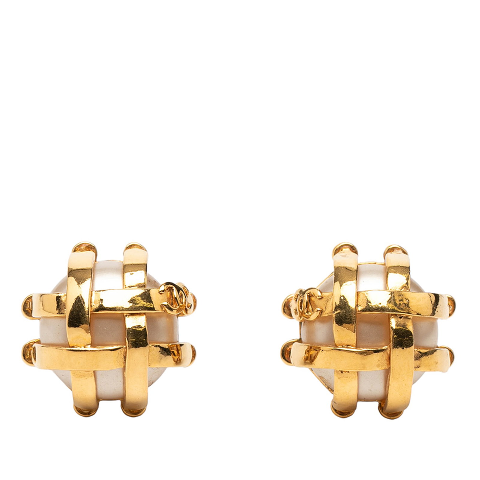 Chanel Caged Faux Pearl Gold Plated Clip On Earrings: Chanel Caged Faux Pearl Gold Plated Clip On Earrings These Chanel clip-on earrings feature gold-plated metal bodies with caged faux pearl embellishments. Designed in a classic round shape, they offer 