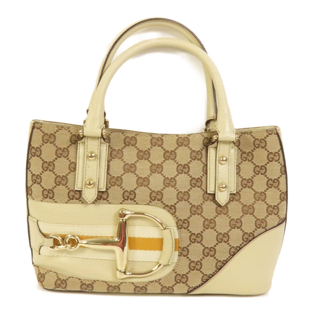 Beige GG Canvas Horsebit Tote by Gucci with Gold Tone Hardware: Beige GG Canvas Horsebit Tote by Gucci with Gold Tone Hardware This GUCCI tote handbag features the iconic GG canvas in a beige color, accented with gold hardware and the signature horsebit detail. De