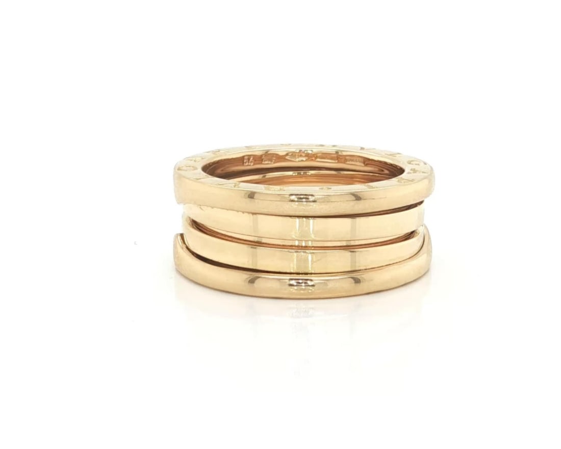 Bvlgari B.zero1 18k Yellow Gold Ring Size 6.5 EU 54: Bvlgari B.zero1 18k Yellow Gold Ring Size 6.5 EU 54 This Bvlgari B.zero1 ring is crafted from 18k yellow gold and features the iconic spiral design. Made in Italy, the ring is a three-band version in 