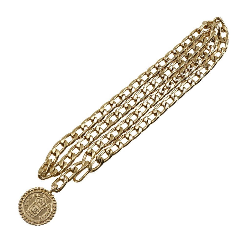 Gold Plated Chanel Medallion Chain Belt Vintage Style: Gold Plated Chanel Medallion Chain Belt Vintage Style This Chanel vintage medallion chain belt for women features a gold-plated metal construction with a length of 95 cm. It is in very good condition,
