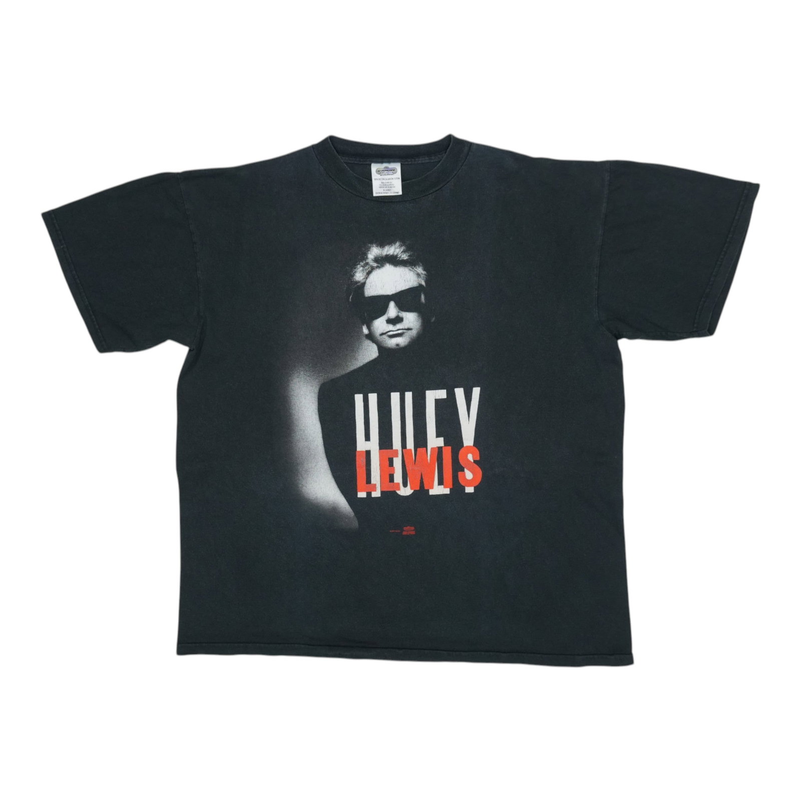 Vintage 1994 Huey Lewis Black Cotton Extra Large T Shirt: Vintage 1994 Huey Lewis Black Cotton Extra Large T Shirt This is an original vintage 1994 Huey Lewis shirt, not a modern reproduction. Made from 100% cotton, this black shirt features no back graphics